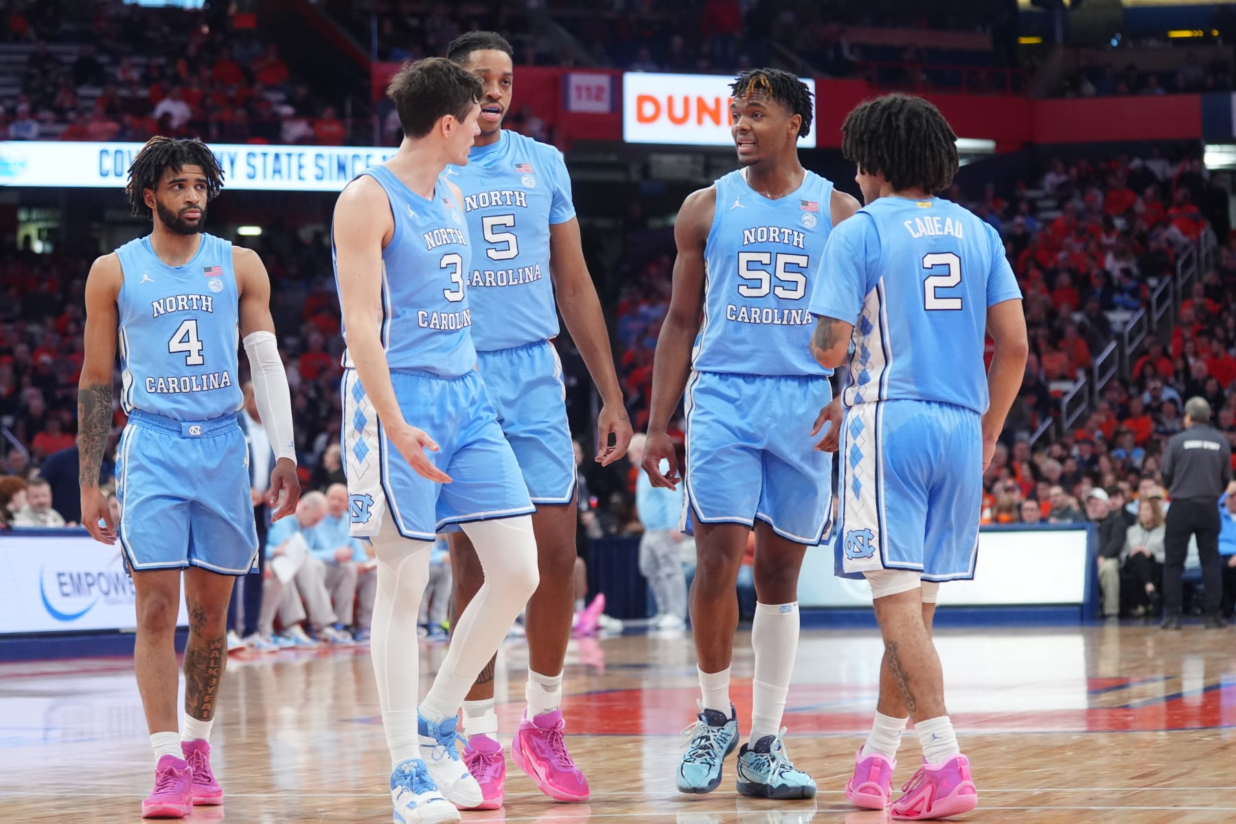 SYRACUSE, NY - FEBRUARY 13: The North Carolina Tar Heels huddle during the second half of the College Basketball game between the North Carolina Tar Heels and the Syracuse Orange on February 13, 2024, at the JMA Wireless Dome in Syracuse, NY. (Photo by Gregory Fisher/Icon Sportswire via Getty Images)