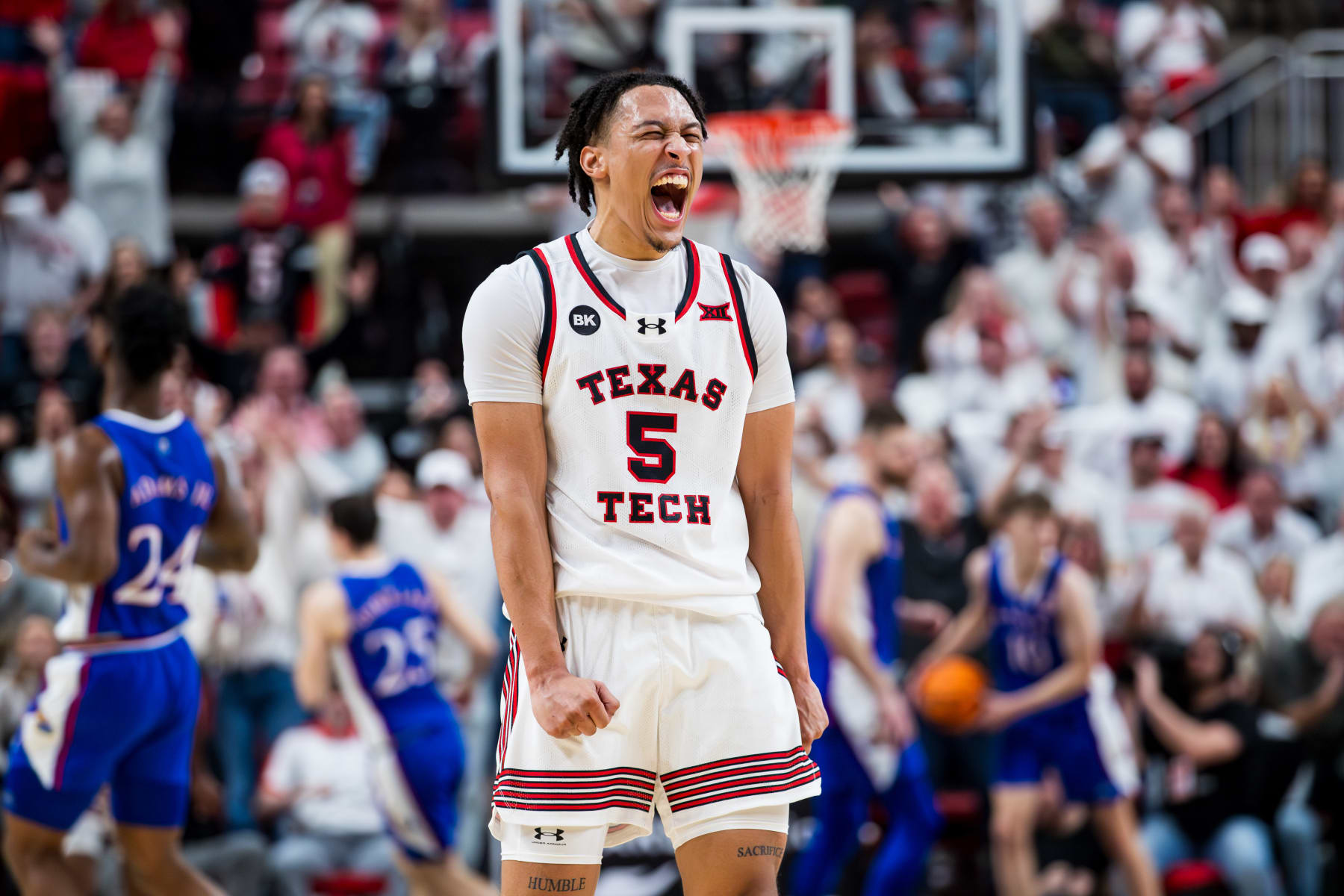 LUBBOCK, TEXAS - FEBRUARY 12: Darrion Williams #5 of the Texas Tech Red Raiders shouts during the second half of the game against the Kansas Jayhawks at United Supermarkets Arena on February 12, 2024 in Lubbock, Texas. (Photo by John E. Moore III/Getty Images)