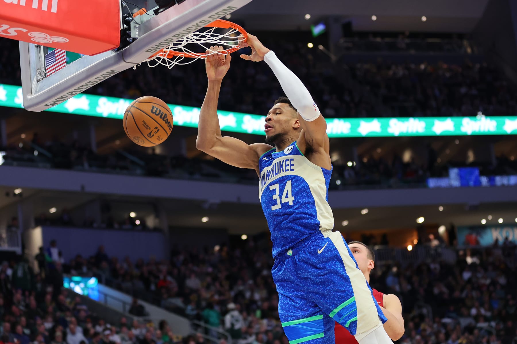 giannis antetokounmpo dunks from outside the three point line