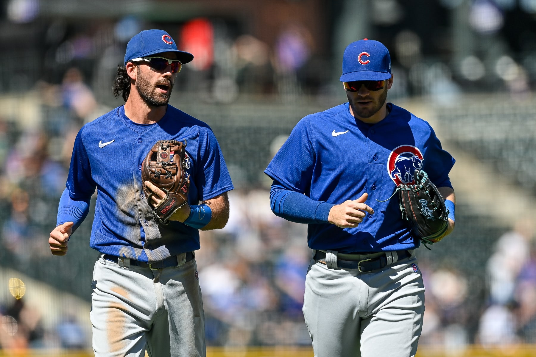 Dansby Swanson (L) and Ian Happ (R)