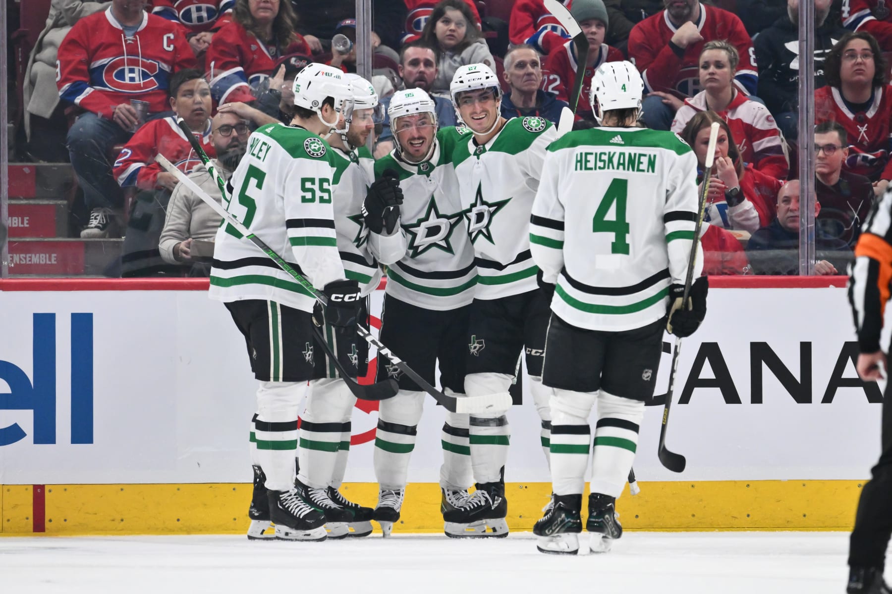 MONTREAL, CANADA - FEBRUARY 10: Tyler Seguin #91 of the Dallas Stars celebrates his goal with teammates Thomas Harley #55, Matt Duchene #95, Mason Marchment #27 and Miro Heiskanen #4 during the second period against the Montreal Canadiens at the Bell Centre on February 10, 2024 in Montreal, Quebec, Canada. (Photo by Minas Panagiotakis/Getty Images)