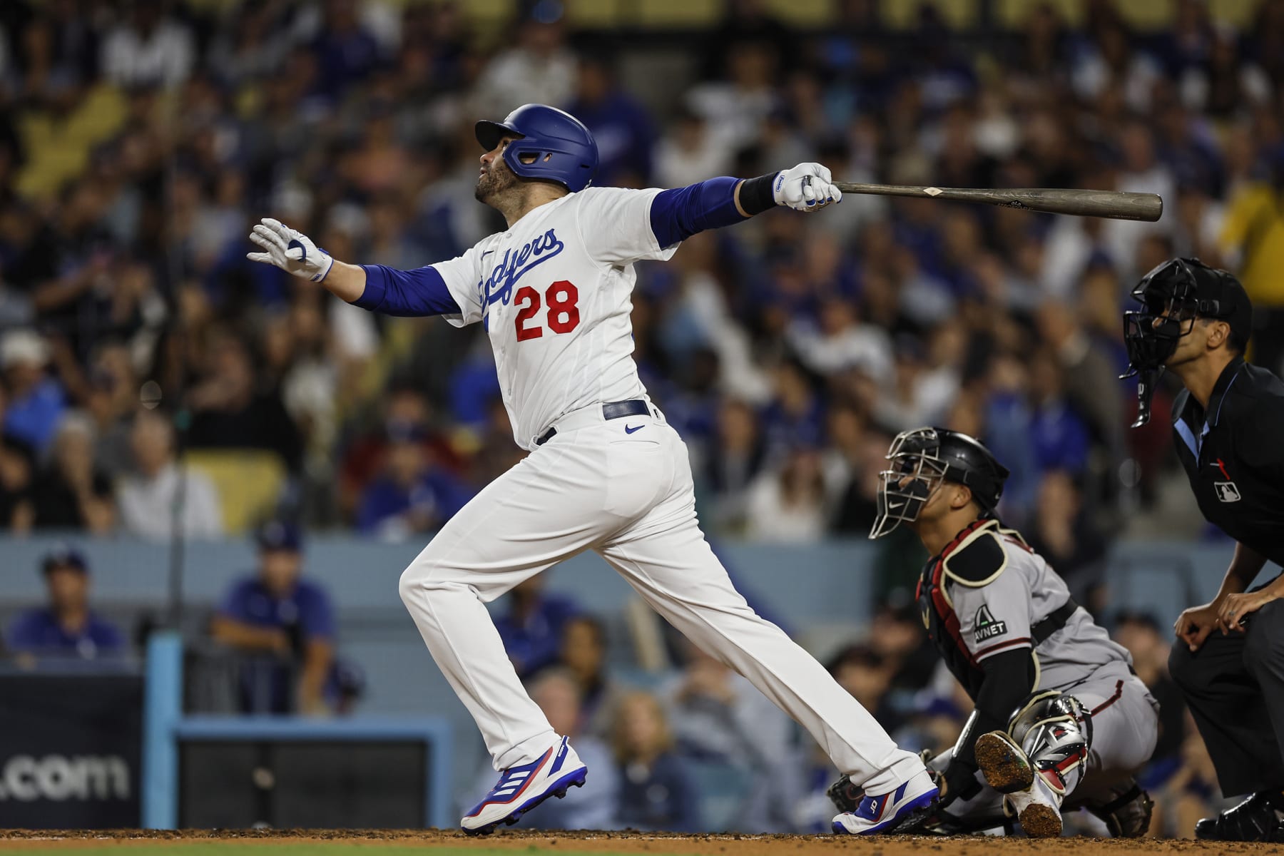 Los Angeles, CA, Monday, October 9, 2023 - Los Angeles Dodgers designated hitter J.D. Martinez (28) homers in the 4th inning of game two of the National League Division Series at Dodger Stadium. (Robert Gauthier/Los Angeles Times via Getty Images)