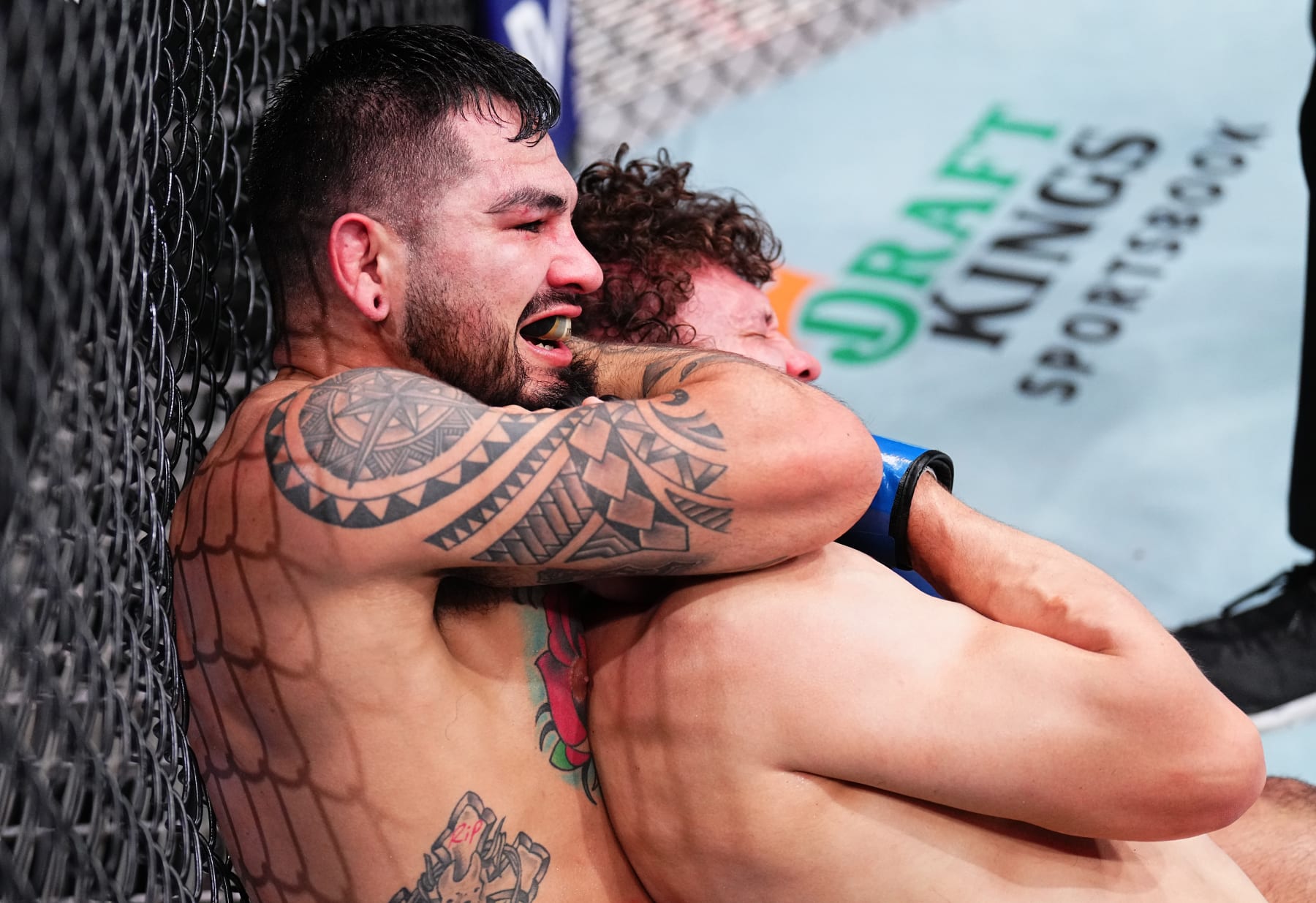 ANAHEIM, CALIFORNIA - FEBRUARY 17: (L-R) Anthony Hernandez secures a rear choke submission against Roman Kopylov of Russia in a middleweight fight during the UFC 298 event at Honda Center on February 17, 2024 in Anaheim, California. (Photo by Chris Unger/Zuffa LLC via Getty Images)