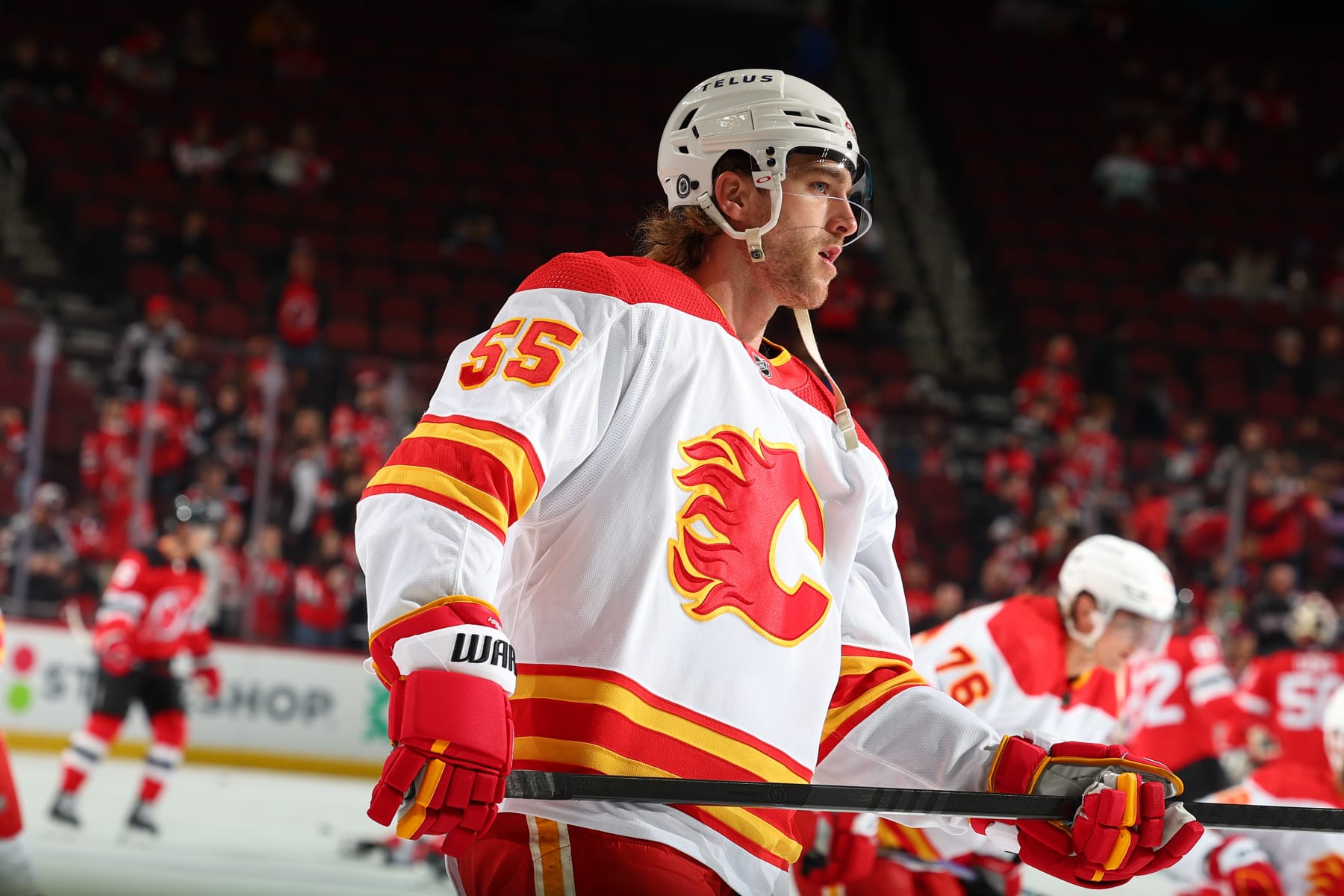 NEWARK, NJ - FEBRUARY 08: Noah Hanifin #55 of the Calgary Flames warms up prior to the game against the New Jersey Devils at the Prudential Center on February 8, 2024 in Newark, New Jersey. (Photo by Rich Graessle/NHLI via Getty Images)