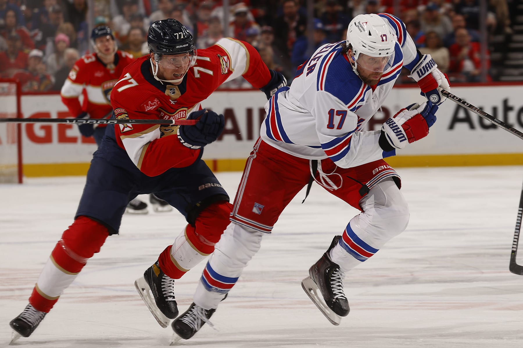 SUNRISE, FLORIDA - DECEMBER 29: Blake Wheeler #17 of the New York Rangers skates for position against Niko Mikkola #77 of the Florida Panthers at the Amerant Bank Arena on December 29, 2023 in Sunrise, Florida. (Photo by Eliot J. Schechter/NHLI via Getty Images)