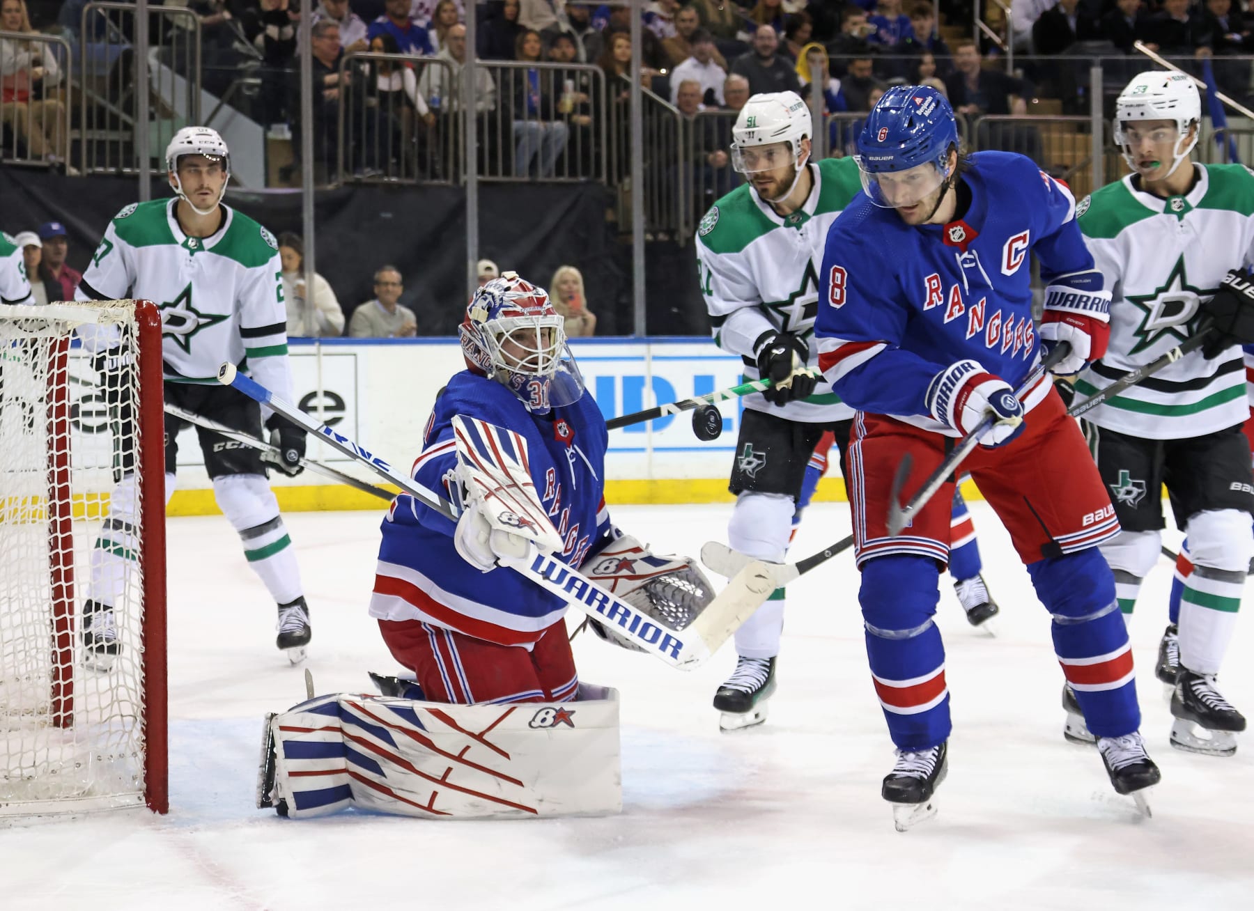 NEW YORK, NEW YORK - FEBRUARY 20: Igor Shesterkin #31 of the New York Rangers makes the stick save in the closing seconds of the first period against the Dallas Stars at Madison Square Garden on February 20, 2024 in New York City. (Photo by Bruce Bennett/Getty Images)