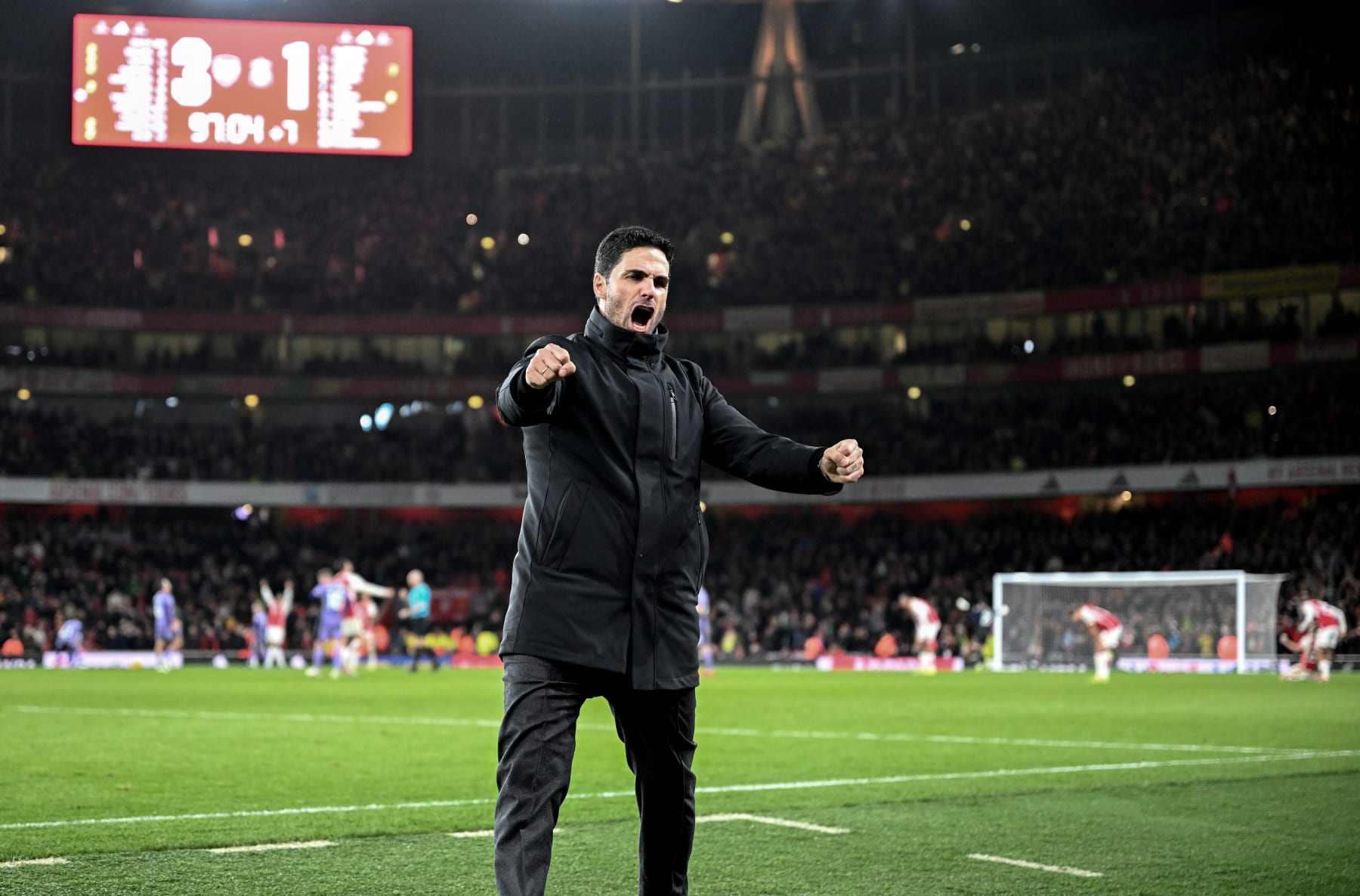 LONDON, ENGLAND - FEBRUARY 04: Mikel Arteta, Manager of Arsenal, celebrates after the team's victory in the Premier League match between Arsenal FC and Liverpool FC at Emirates Stadium on February 04, 2024 in London, England. (Photo by Stuart MacFarlane/Arsenal FC via Getty Images)