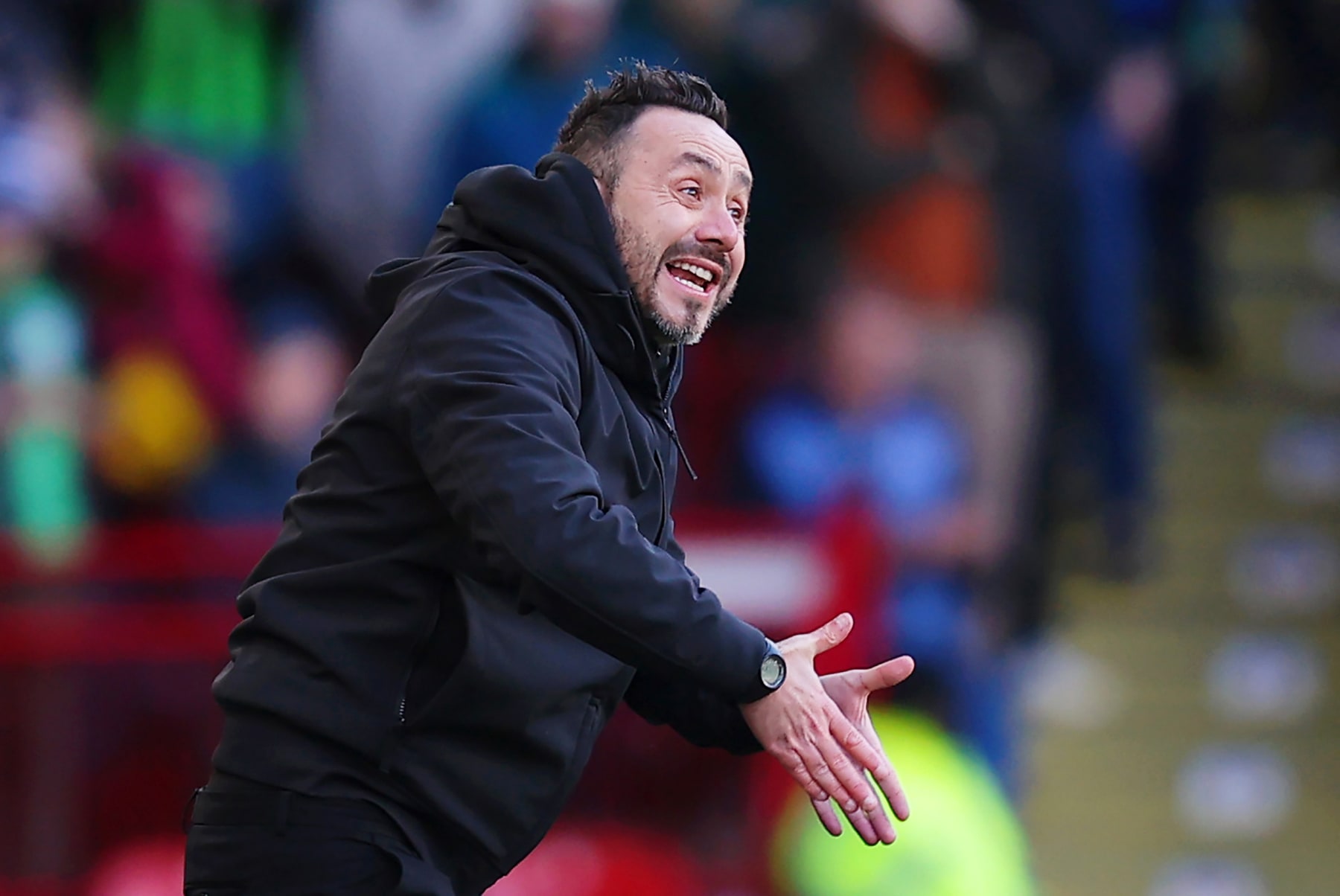 SHEFFIELD, ENGLAND - FEBRUARY 18: Roberto De Zerbi, Manager of Brighton & Hove Albion, gives the team instructions during the Premier League match between Sheffield United and Brighton & Hove Albion at Bramall Lane on February 18, 2024 in Sheffield, England. (Photo by Matt McNulty/Getty Images)