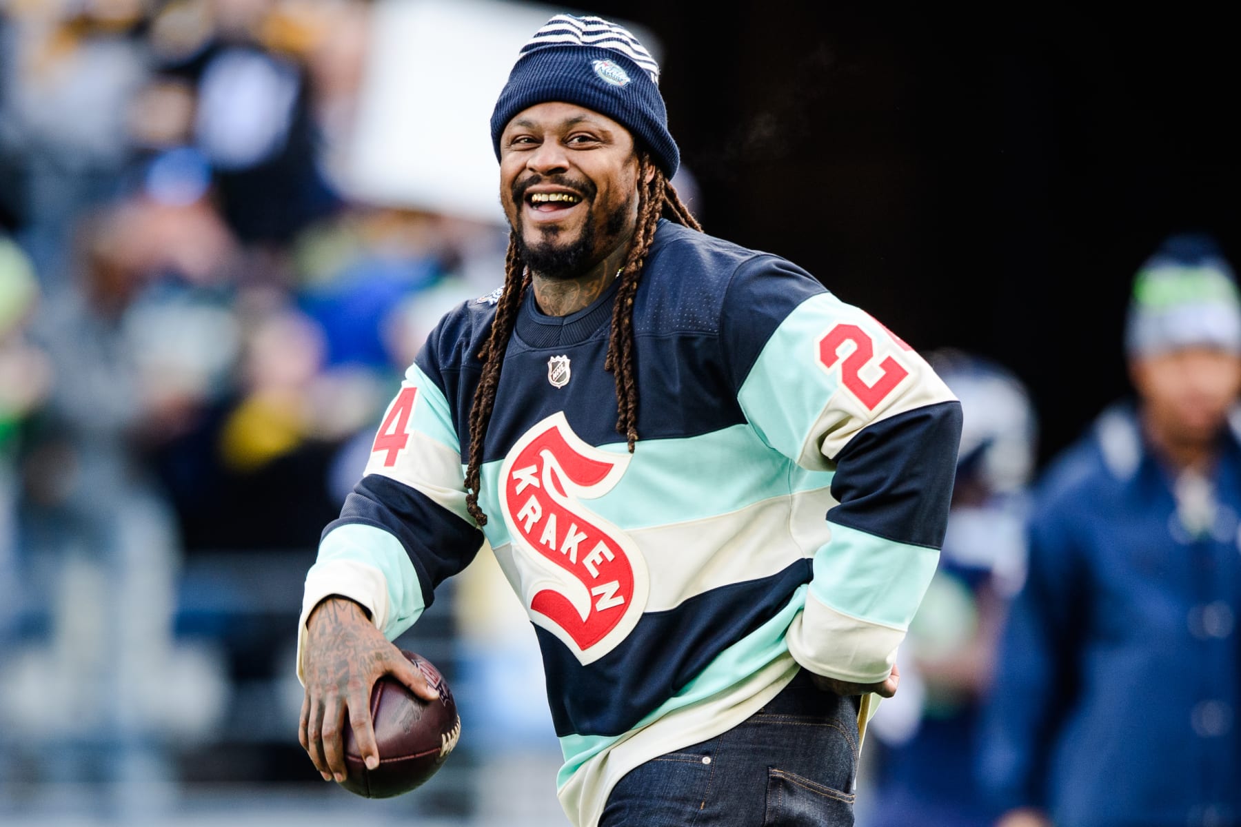 SEATTLE, WASHINGTON - DECEMBER 31: Former Seattle Seahawk Marshawn Lynch looks on before the game against the Pittsburgh Steelers at Lumen Field on December 31, 2023 in Seattle, Washington. (Photo by Jane Gershovich/Getty Images)