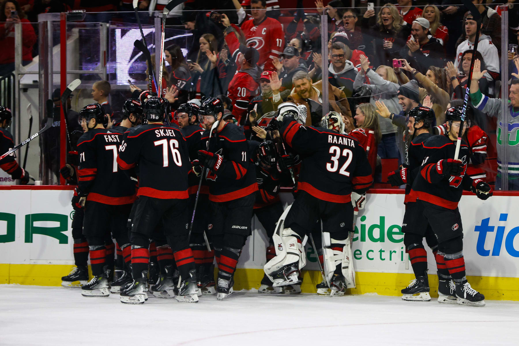 RALEIGH, NC - JANUARY 19: Carolina Hurricanes celebrates a win after the third period of the game against the Detroit Red Wings at PNC Arena on January 19, 2024 in Raleigh, North Carolina. (Photo by Jaylynn Nash/Getty Images)*** Local Caption ***