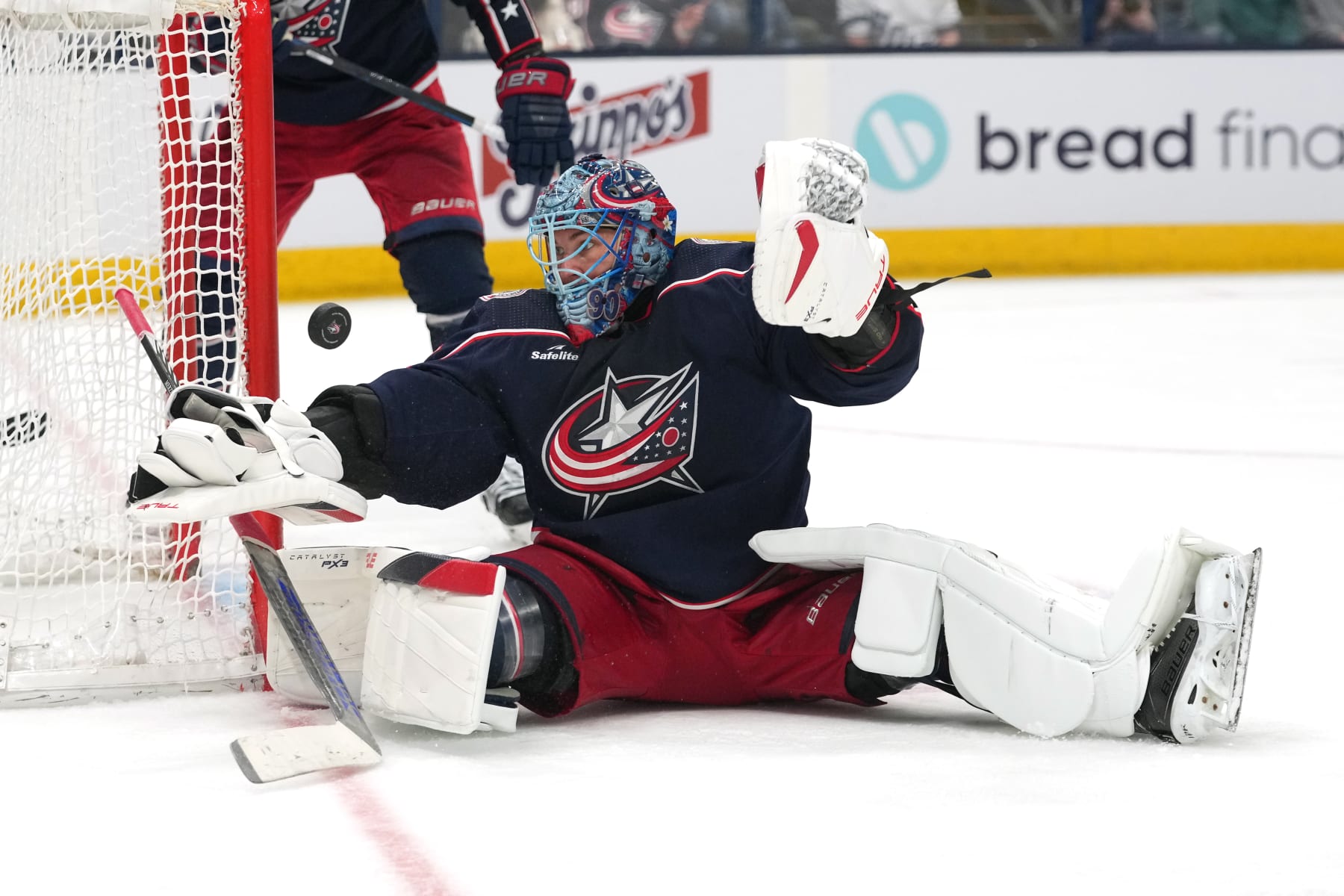 COLUMBUS, OHIO - FEBRUARY 10: Elvis Merzlikins #90 of the Columbus Blue Jackets attempts to make as save in third period against the Tampa Bay Lightning at Nationwide Arena on February 10, 2024 in Columbus, Ohio. (Photo by Jason Mowry/Getty Images)