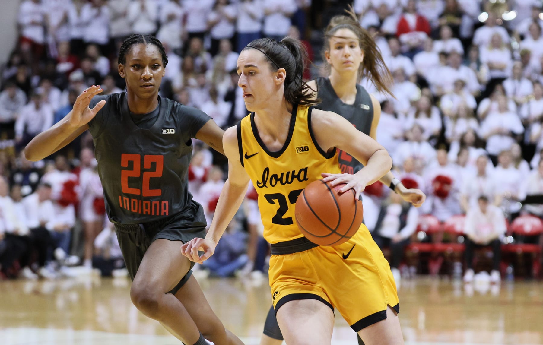 BLOOMINGTON, INDIANA - FEBRUARY 22: Caitlin Clark #22 of the Iowa Hawkeyes dribbles the ball in the first half against the Indiana Hoosiers at Simon Skjodt Assembly Hall on February 22, 2024 in Bloomington, Indiana. (Photo by Andy Lyons/Getty Images)
