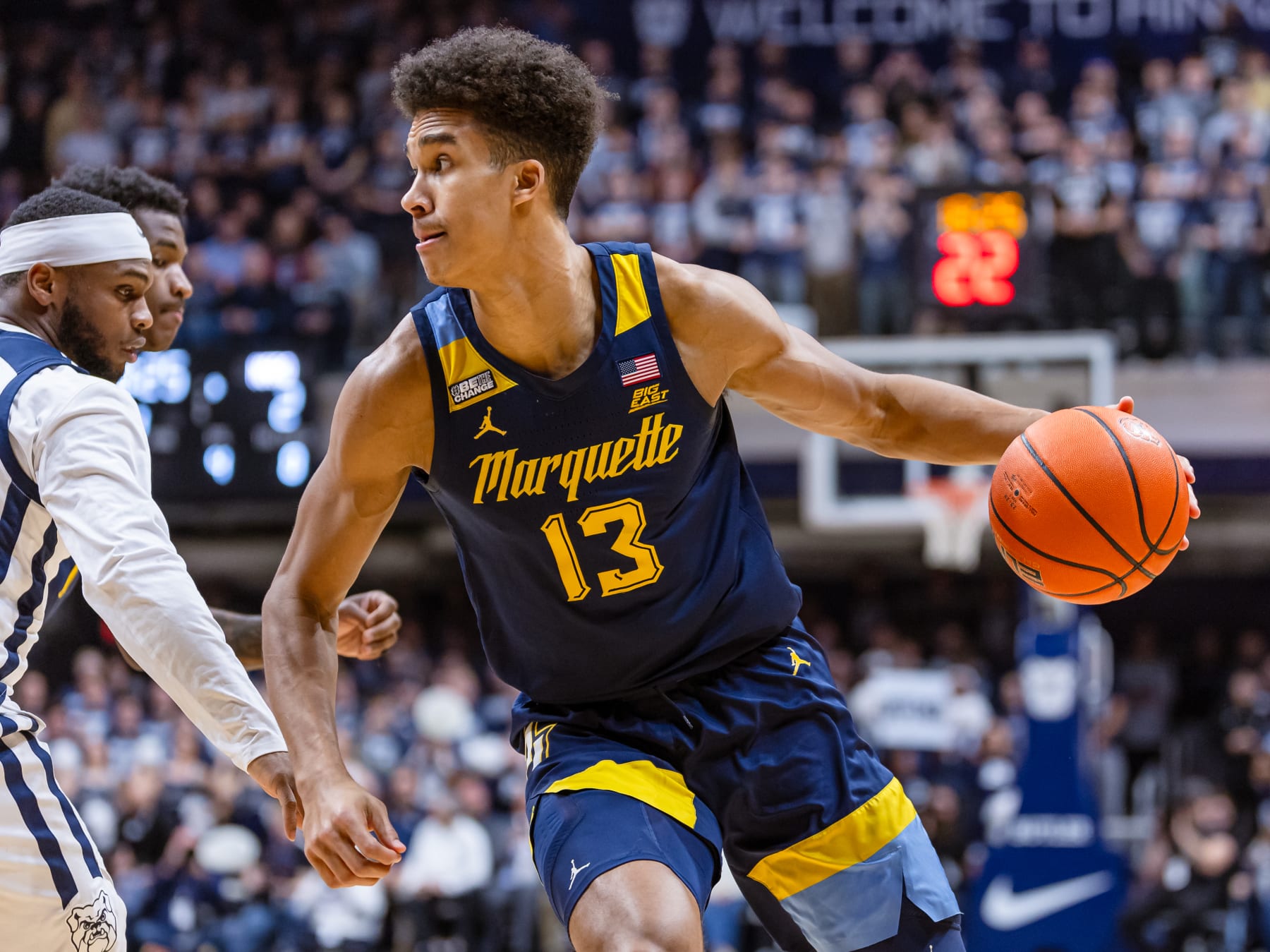 INDIANAPOLIS, INDIANA - FEBRUARY 13: Oso Ighodaro #13 of the Marquette Golden Eagles dribbles during the game against the Butler Bulldogs at Hinkle Fieldhouse on February 13, 2024 in Indianapolis, Indiana. (Photo by Michael Hickey/Getty Images)