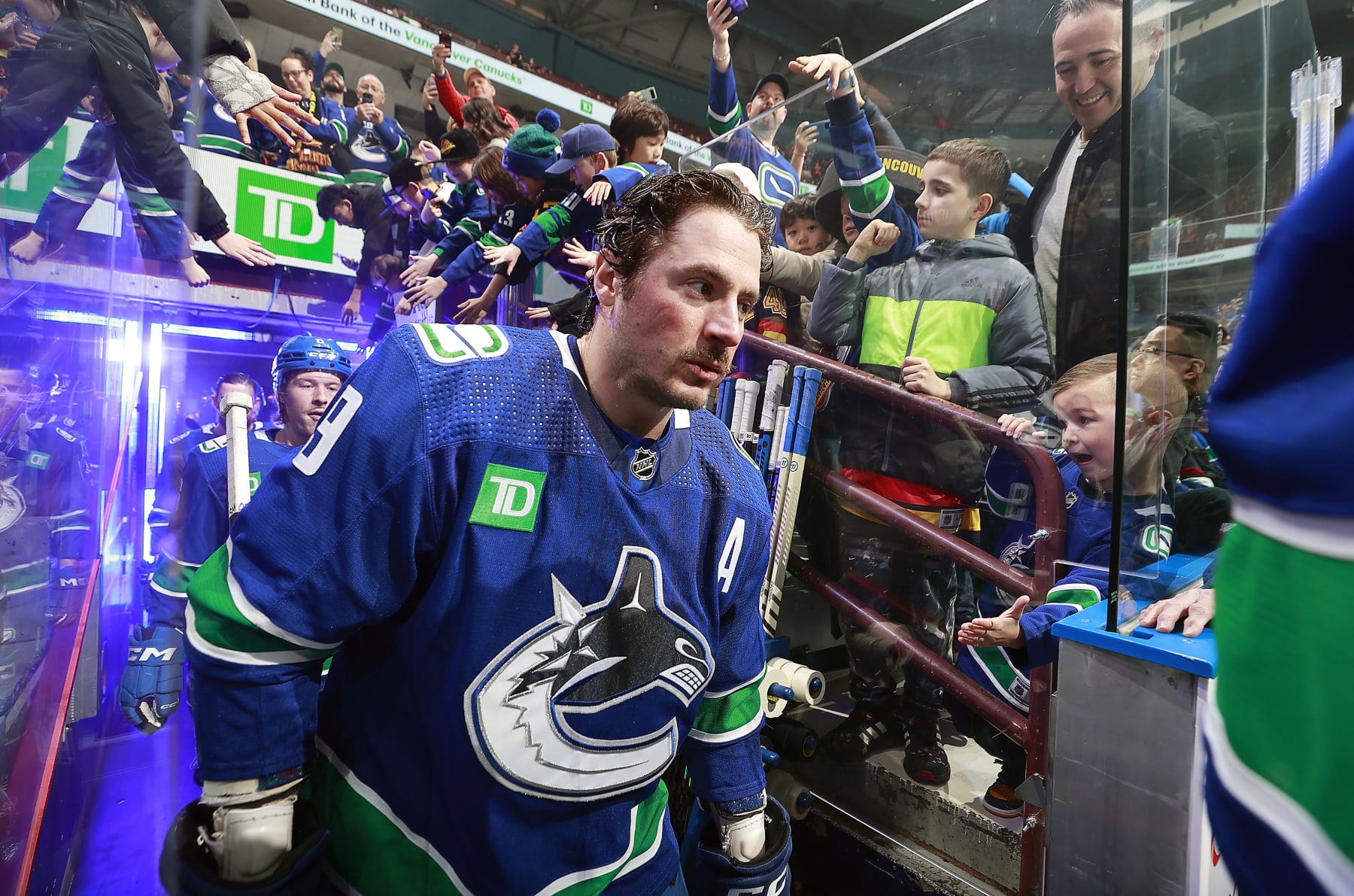 VANCOUVER, CANADA - FEBRUARY 17: J.T. Miller #9 of the Vancouver Canucks walks out to the ice during their NHL game against the Winnipeg Jets at Rogers Arena on February 17, 2024 in Vancouver, British Columbia, Canada. (Photo by Jeff Vinnick/NHLI via Getty Images)