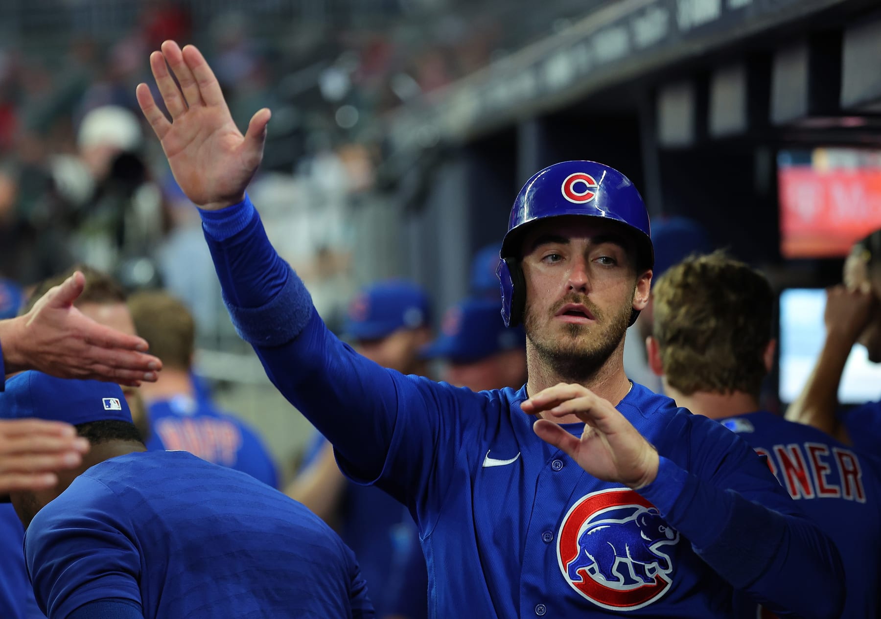 ATLANTA, GEORGIA - SEPTEMBER 26:  Cody Bellinger #24 of the Chicago Cubs reacts after scoring on a RBI single by Yan Gomes #15 in the second inning at Truist Park on September 26, 2023 in Atlanta, Georgia. (Photo by Kevin C. Cox/Getty Images)
