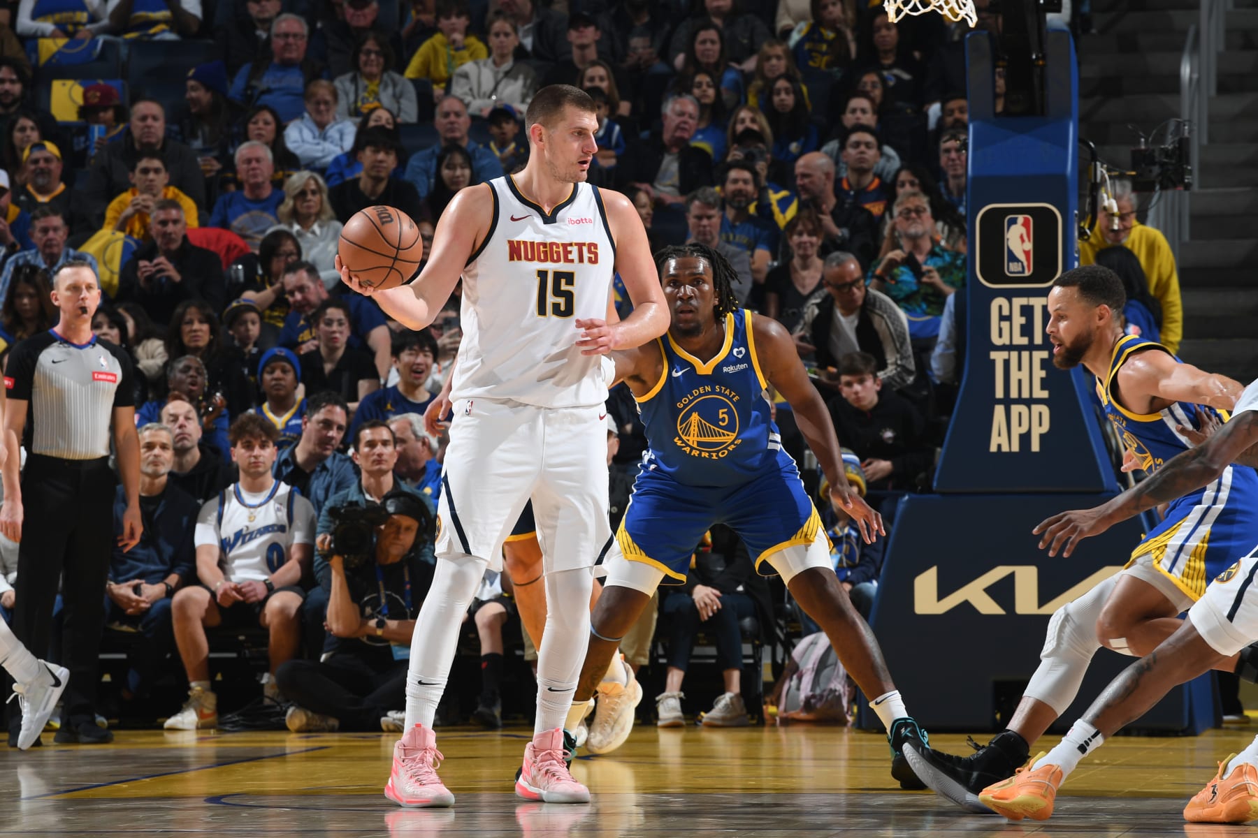 SAN FRANCISCO, CA - FEBRUARY 25:  Nikola Jokic #15 of the Denver Nuggets handles the ball during the game against the Golden State Warriors on February 25, 2024 at Chase Center in San Francisco, California. NOTE TO USER: User expressly acknowledges and agrees that, by downloading and or using this photograph, user is consenting to the terms and conditions of Getty Images License Agreement. Mandatory Copyright Notice: Copyright 2024 NBAE (Photo by Noah Graham/NBAE via Getty Images)