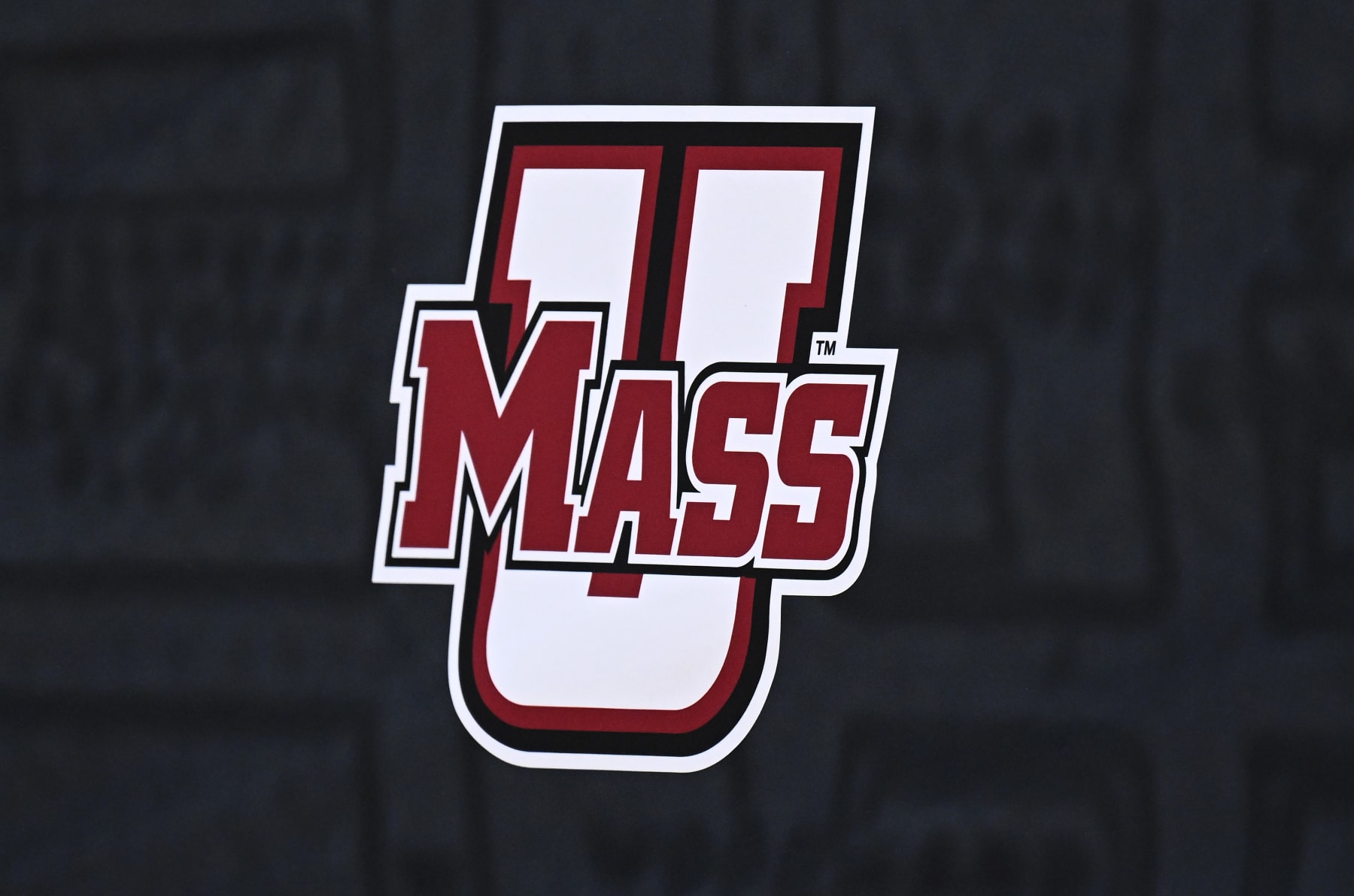 WASHINGTON, DC - MARCH 11: The Massachusetts Minutemen logo on display during the Quarterfinals of the 2022 Atlantic 10 Men's Basketball Tournament at Capital One Arena on March 11, 2022 in Washington, DC. (Photo by G Fiume/Getty Images)