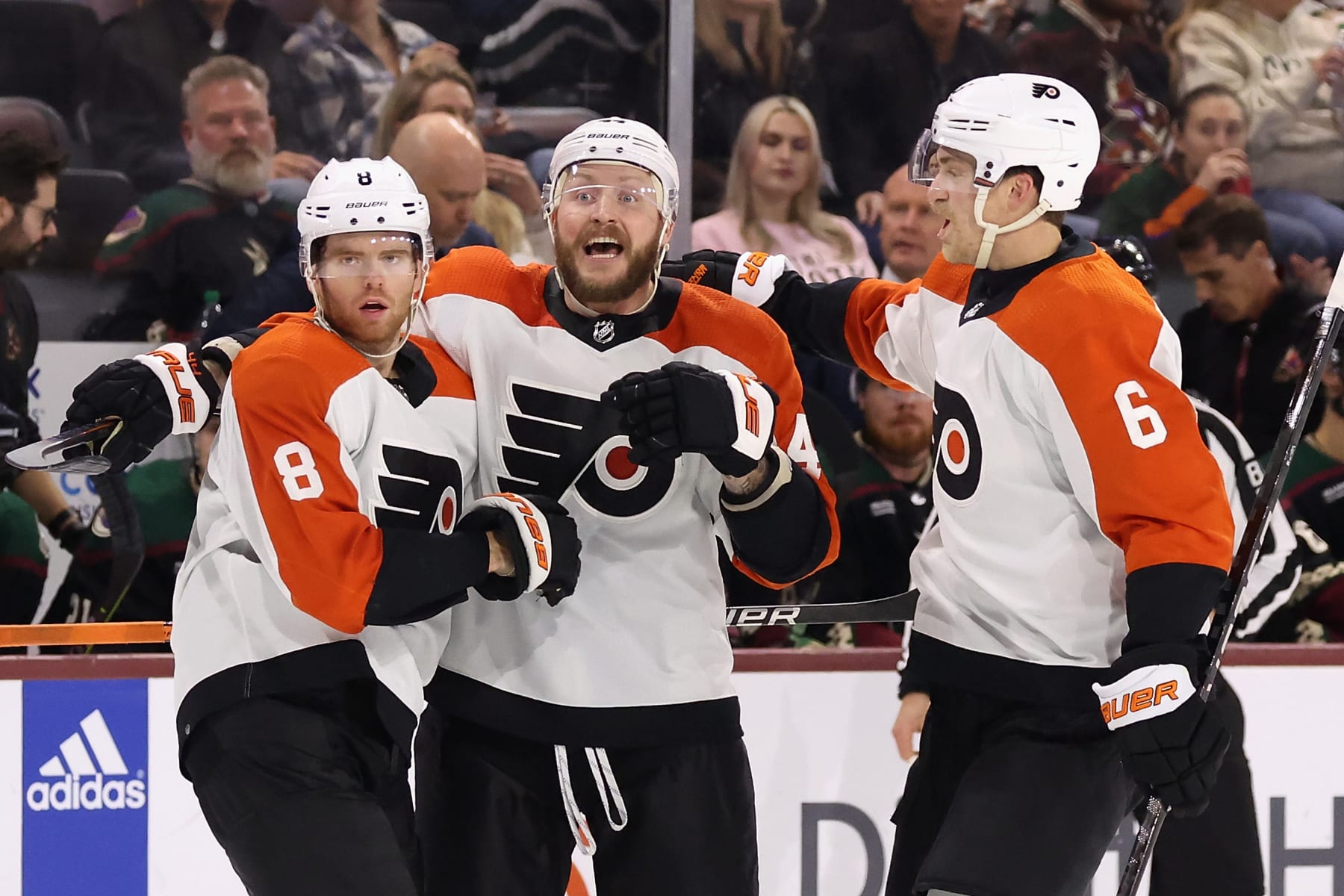 TEMPE, ARIZONA - DECEMBER 07: Cam York #8, Nicolas Deslauriers #44 and Travis Sanheim #6 of the Philadelphia Flyers celebrate after York scored a goal against the Arizona Coyotes during the third period of the NHL game at Mullett Arena on December 07, 2023 in Tempe, Arizona. The Flyers defeated the Coyotes 4-1. (Photo by Christian Petersen/Getty Images)