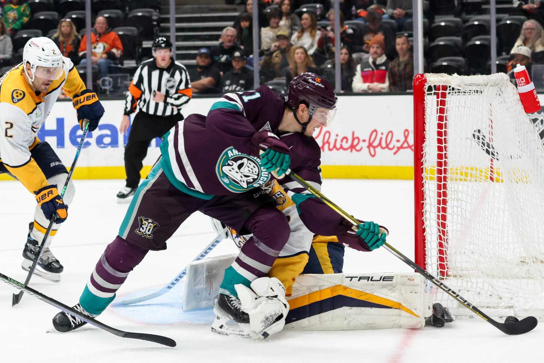 ANAHEIM, CA - FEBRUARY 25: Isac Lundestrom #21 of the Anaheim Ducks skates with the puck during the third period against the Nashville Predators at Honda Center on February 25, 2024 in Anaheim, California. (Photo by Debora Robinson/NHLI via Getty Images)