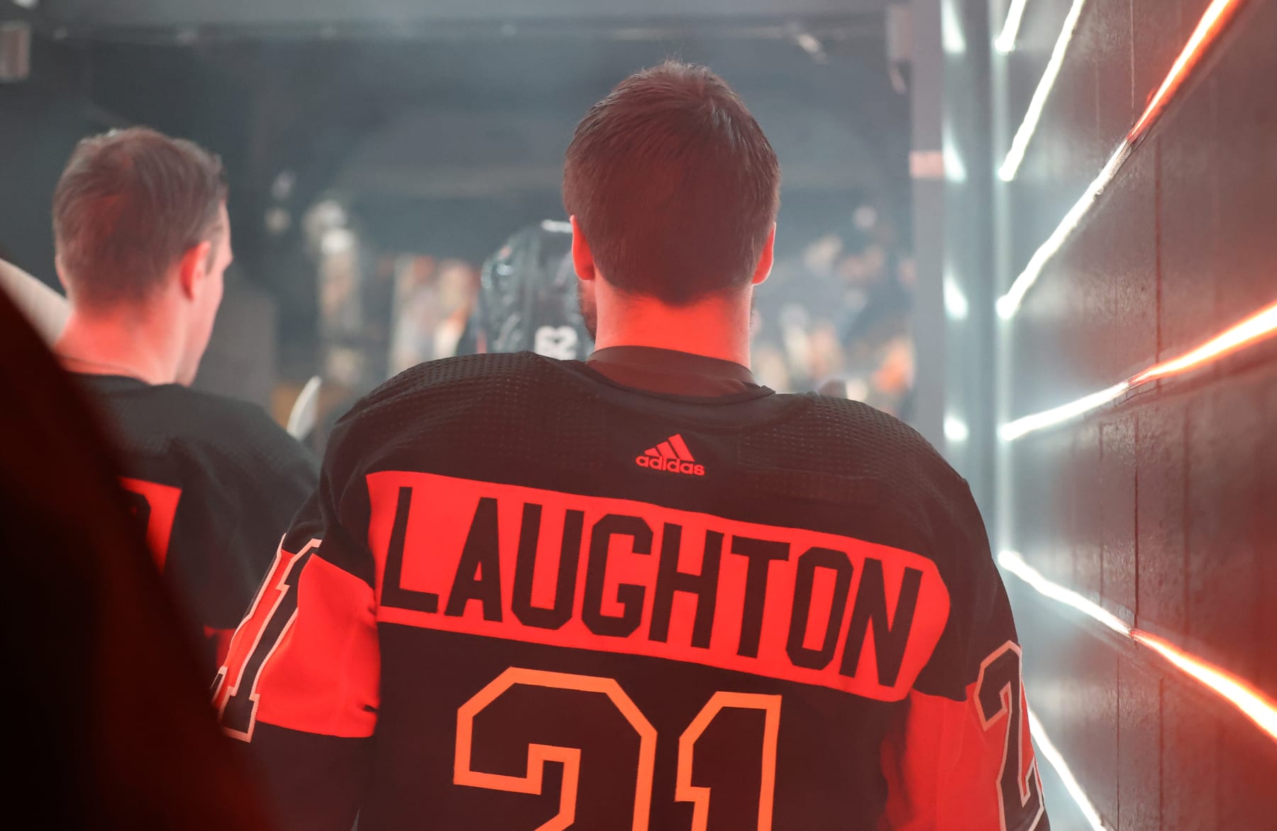 PHILADELPHIA, PENNSYLVANIA - FEBRUARY 12: Scott Laughton #21 of the Philadelphia Flyers walks down the tunnel leading to the ice surface for warm-ups against the Arizona Coyotes at the Wells Fargo Center on February 12, 2024 in Philadelphia, Pennsylvania. (Photo by Len Redkoles/NHLI via Getty Images)