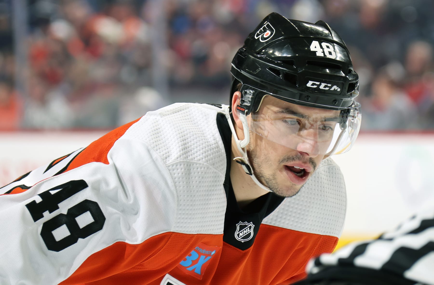 PHILADELPHIA, PENNSYLVANIA - FEBRUARY 24: Morgan Frost #48 of the Philadelphia Flyers looks on prior to a face-off against the New York Rangers at the Wells Fargo Center on February 24, 2024 in Philadelphia, Pennsylvania. (Photo by Len Redkoles/NHLI via Getty Images)