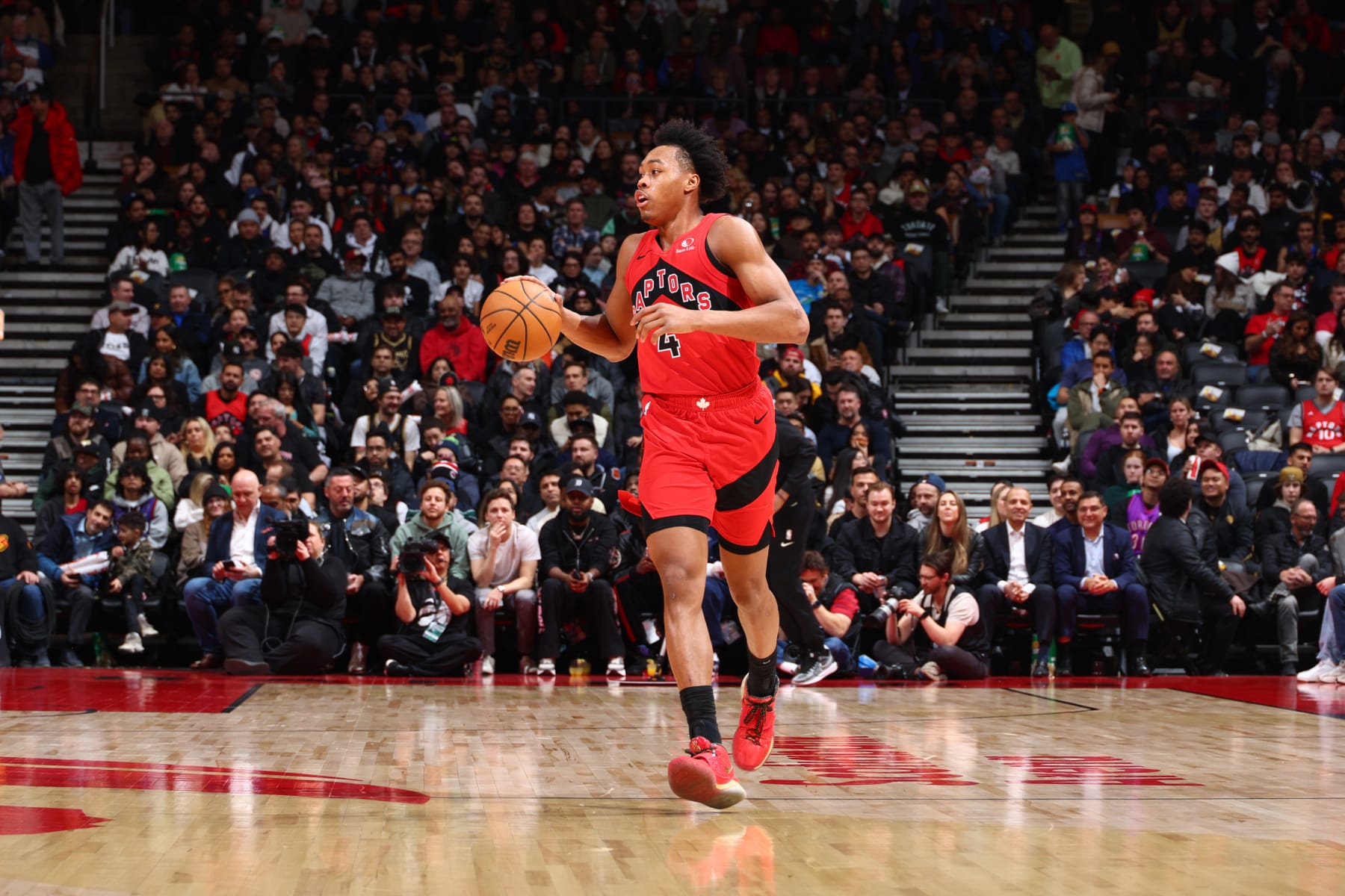 TORONTO, CANADA - FEBRUARY 28: Scottie Barnes #4 of the Toronto Raptors dribbles the ball during the game against the Dallas Mavericks on February 28, 2024 at the Scotiabank Arena in Toronto, Ontario, Canada.  NOTE TO USER: User expressly acknowledges and agrees that, by downloading and or using this Photograph, user is consenting to the terms and conditions of the Getty Images License Agreement.  Mandatory Copyright Notice: Copyright 2024 NBAE (Photo by Vaughn Ridley/NBAE via Getty Images)