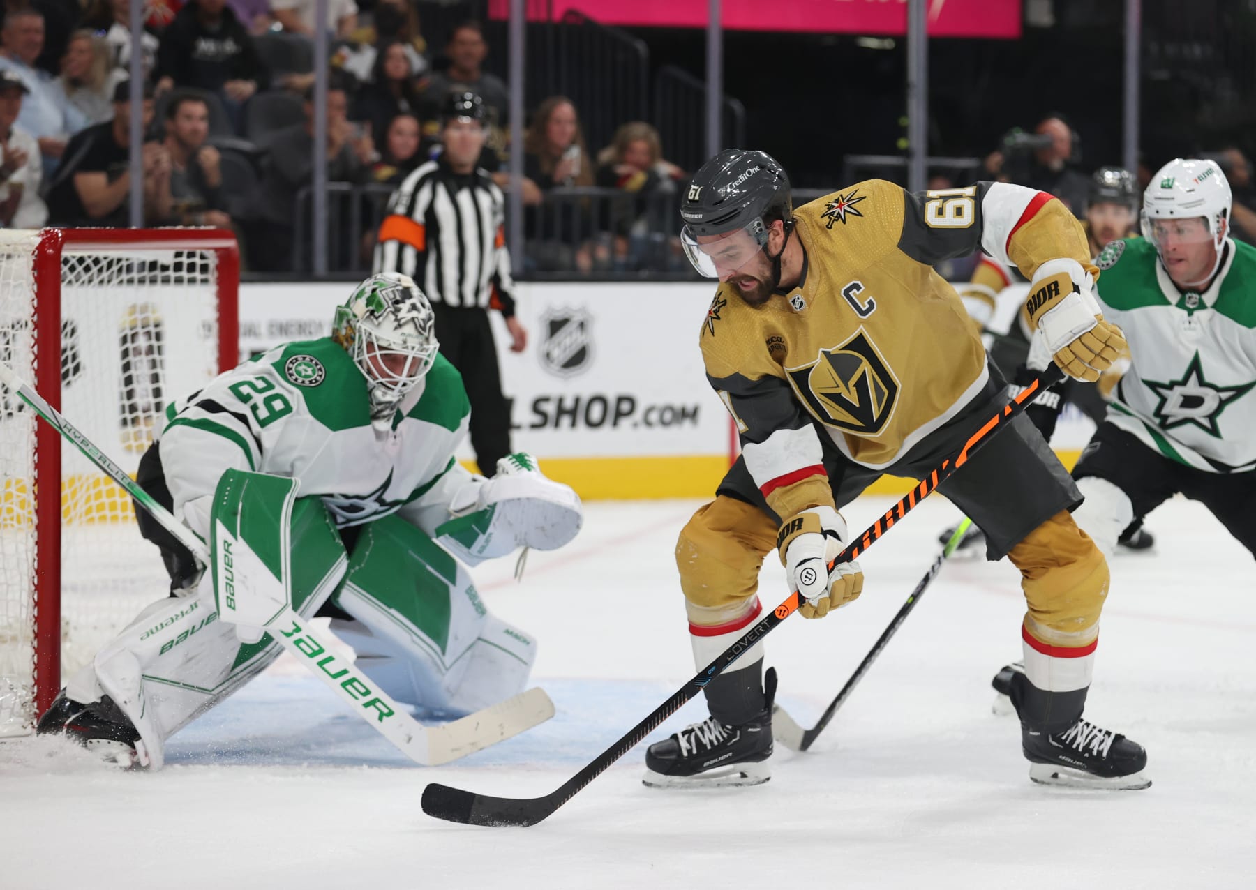 LAS VEGAS, NEVADA - OCTOBER 17: Mark Stone #61 of the Vegas Golden Knights skates against Jake Oettinger #29 of the Dallas Stars during the second period at T-Mobile Arena on October 17, 2023 in Las Vegas, Nevada. (Photo by Zak Krill/NHLI via Getty Images)
