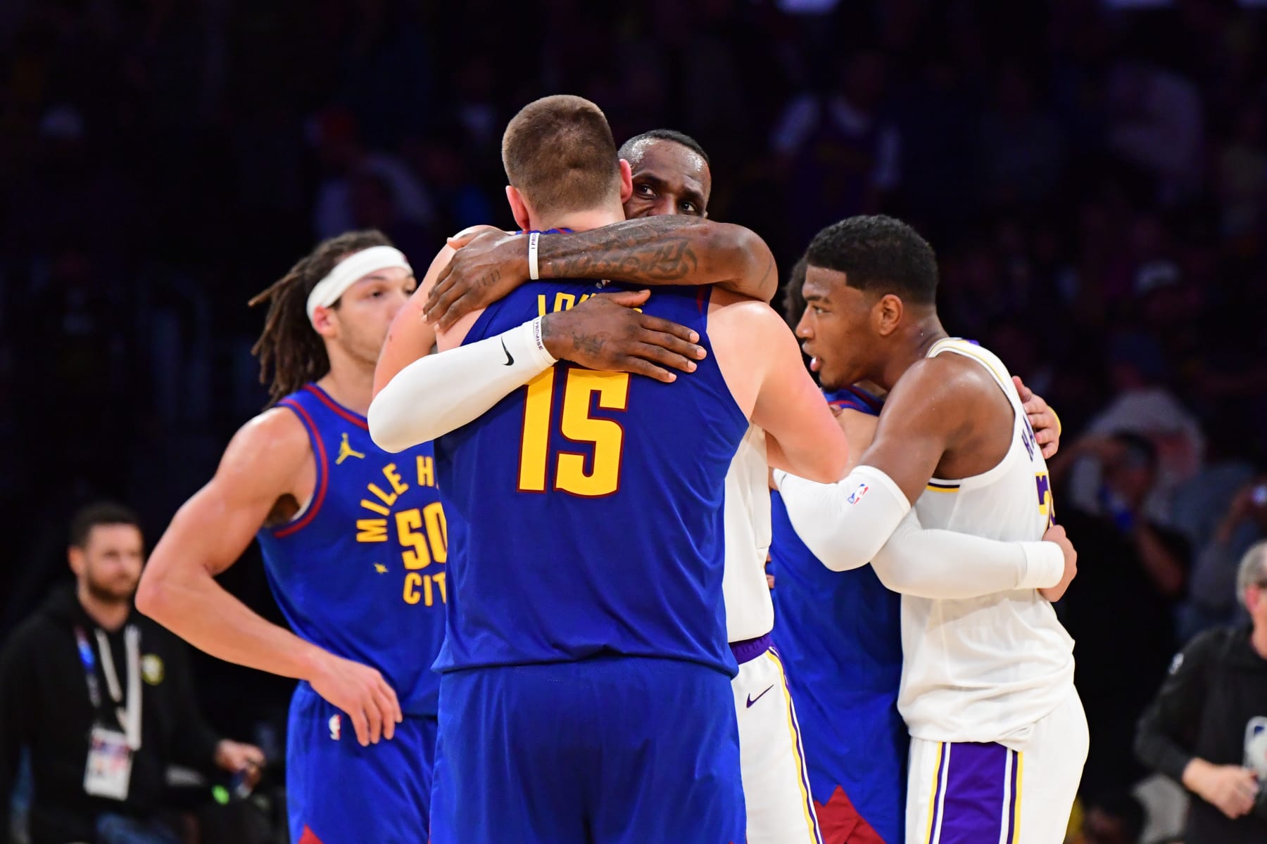LOS ANGELES, CA - MARCH 2: Nikola Jokic #15 of the Denver Nuggets hugs LeBron James #23 of the Los Angeles Lakers after the game on March 2, 2024 at Crypto.Com Arena in Los Angeles, California. NOTE TO USER: User expressly acknowledges and agrees that, by downloading and/or using this Photograph, user is consenting to the terms and conditions of the Getty Images License Agreement. Mandatory Copyright Notice: Copyright 2024 NBAE (Photo by Adam Pantozzi/NBAE via Getty Images)
