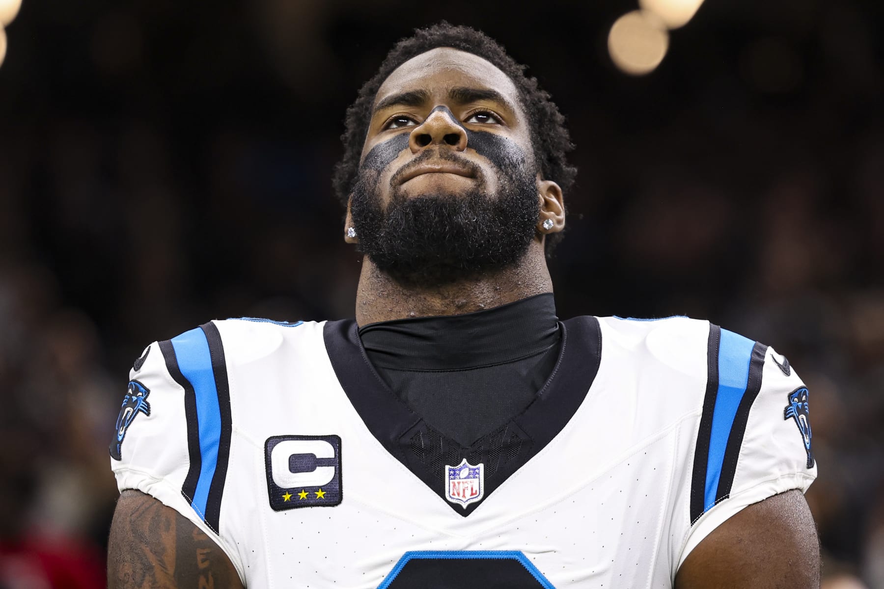 NEW ORLEANS, LA - DECEMBER 10: Brian Burns #0 of the Carolina Panthers looks on from the sideline during the national anthem prior to an NFL football game against the New Orleans Saints at Caesars Superdome on December 10, 2023 in New Orleans, LA. (Photo by Perry Knotts/Getty Images)