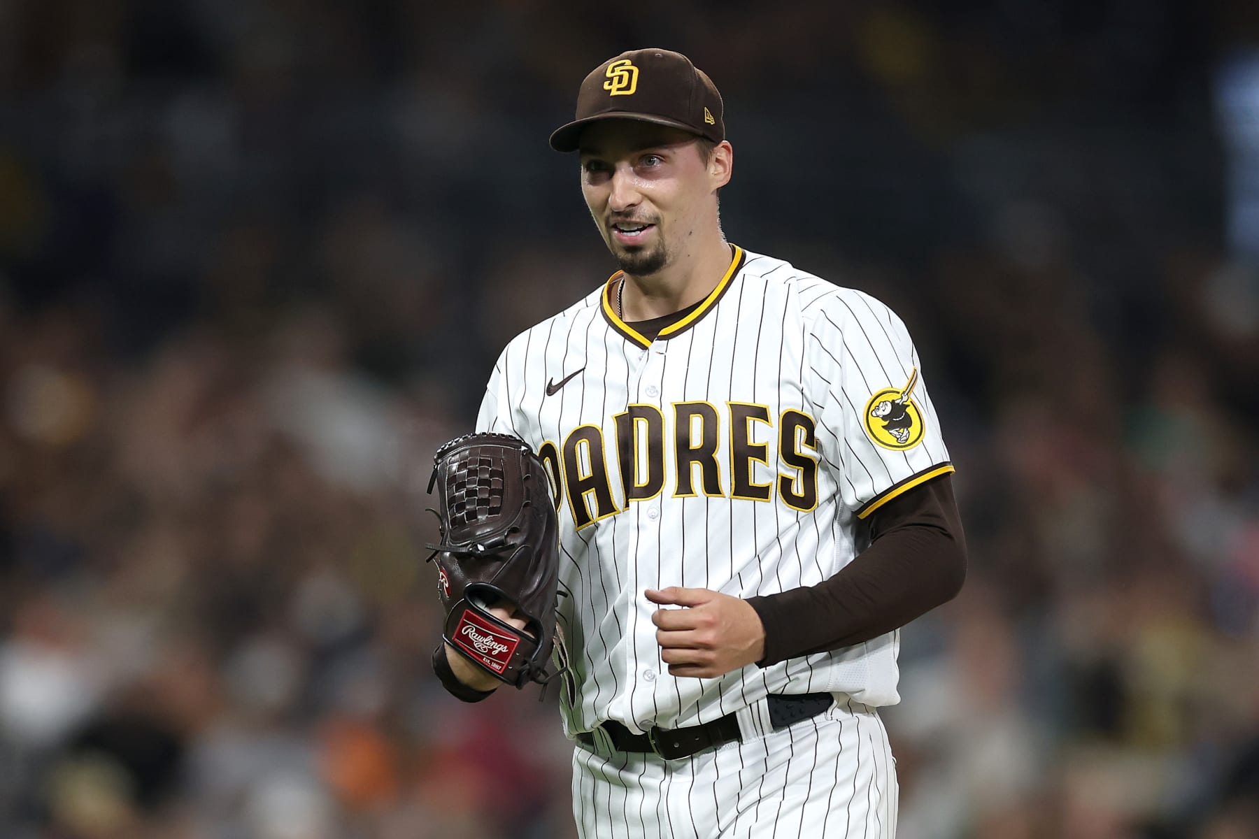 SAN DIEGO, CALIFORNIA - SEPTEMBER 19: Blake Snell #4 of the San Diego Padres looks on during the sixth inning of a game against the Colorado Rockies at PETCO Park on September 19, 2023 in San Diego, California. (Photo by Sean M. Haffey/Getty Images)