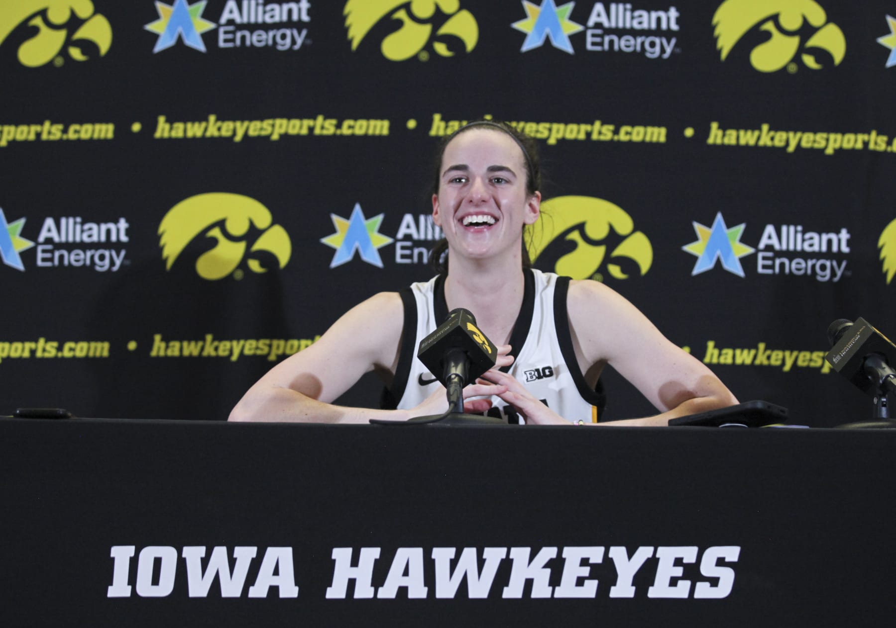IOWA CITY, IOWA- MARCH 3:  Guard Caitlin Clark #22 of the Iowa Hawkeyes answers questions after the match-up against the Ohio State Buckeyes at Carver-Hawkeye Arena on March 3, 2024 in Iowa City, Iowa.  (Photo by Matthew Holst/Getty Images)