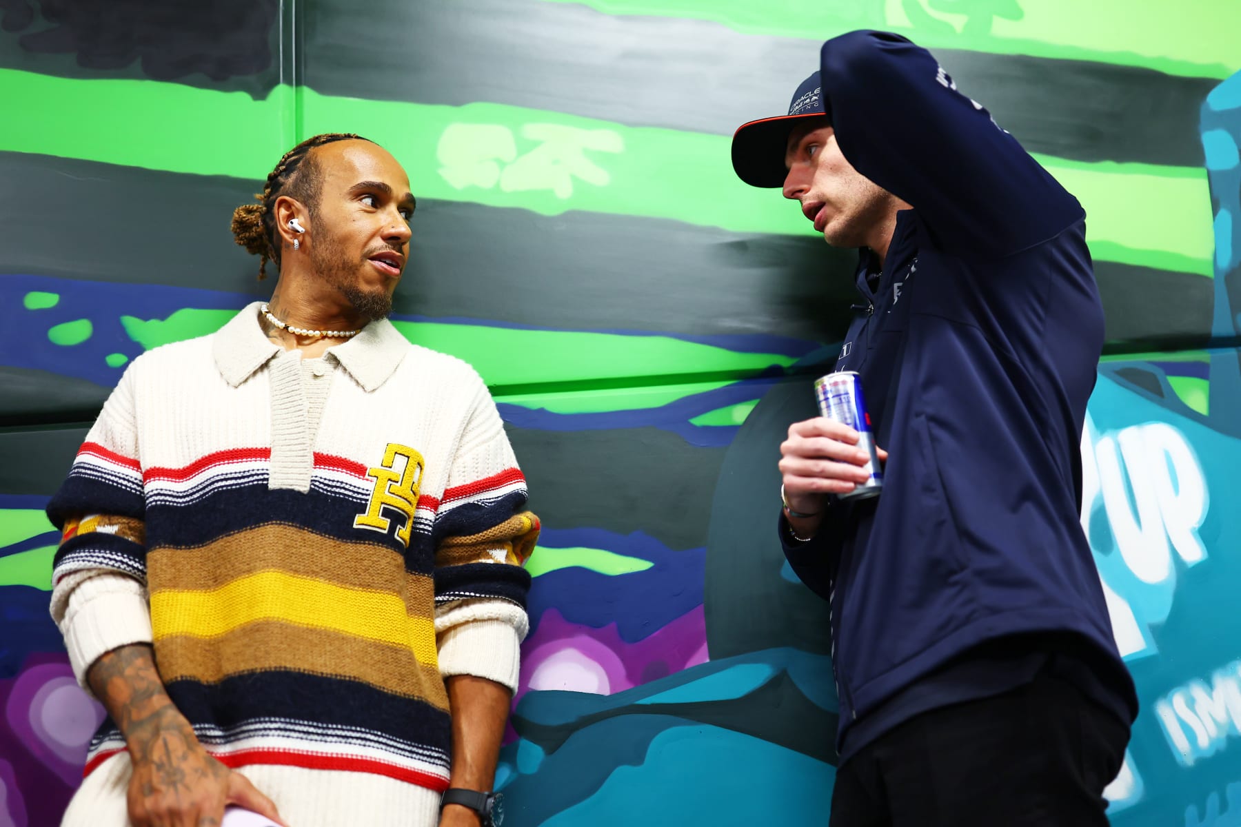 LAS VEGAS, NEVADA - NOVEMBER 18: Lewis Hamilton of Great Britain and Mercedes speaks to Max Verstappen of the Netherlands and Oracle Red Bull Racing prior to the F1 Grand Prix of Las Vegas at Las Vegas Strip Circuit on November 18, 2023 in Las Vegas, Nevada. (Photo by Dan Istitene - Formula 1/Formula 1 via Getty Images)