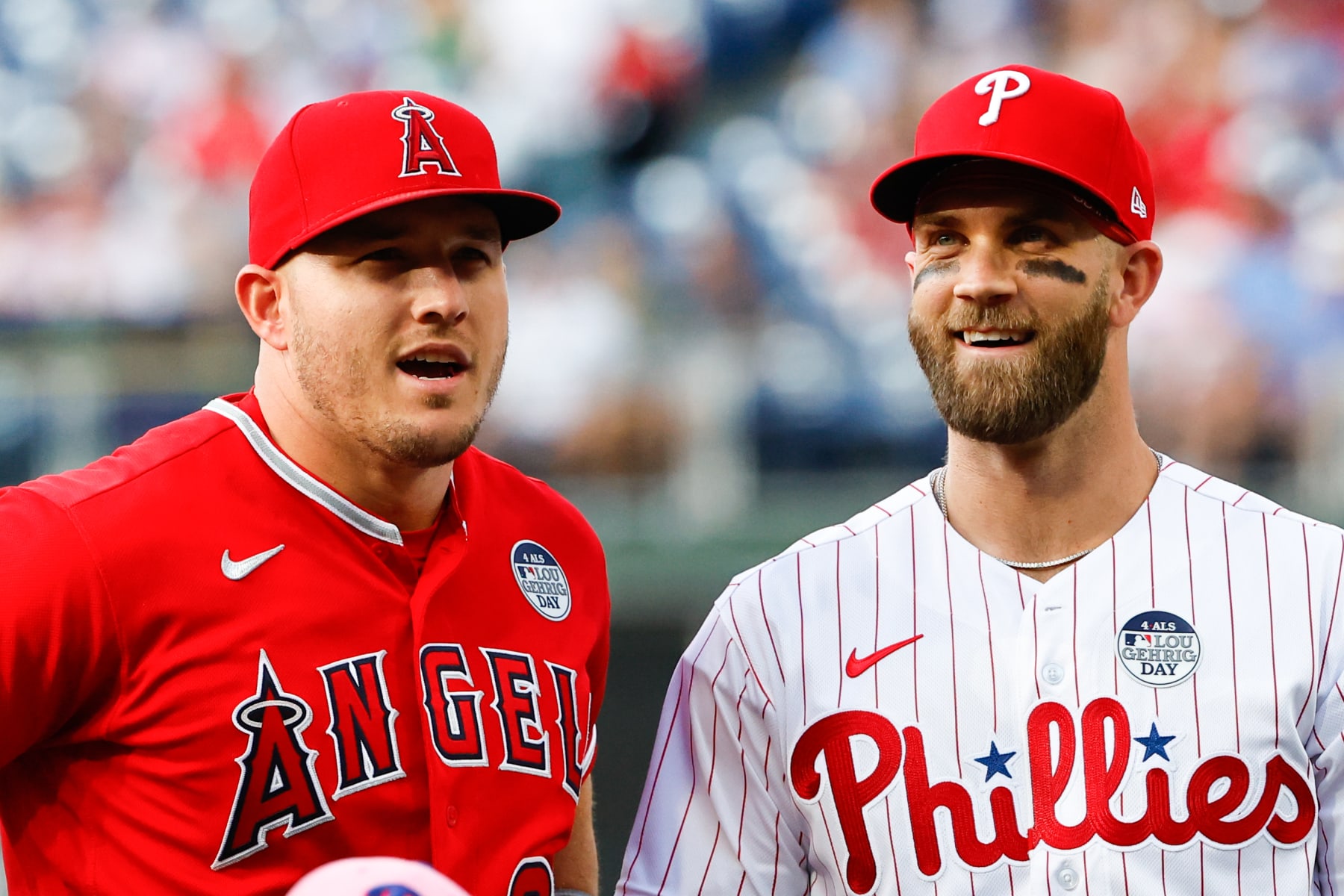 Mike Trout (L) and Bryce Harper (R)