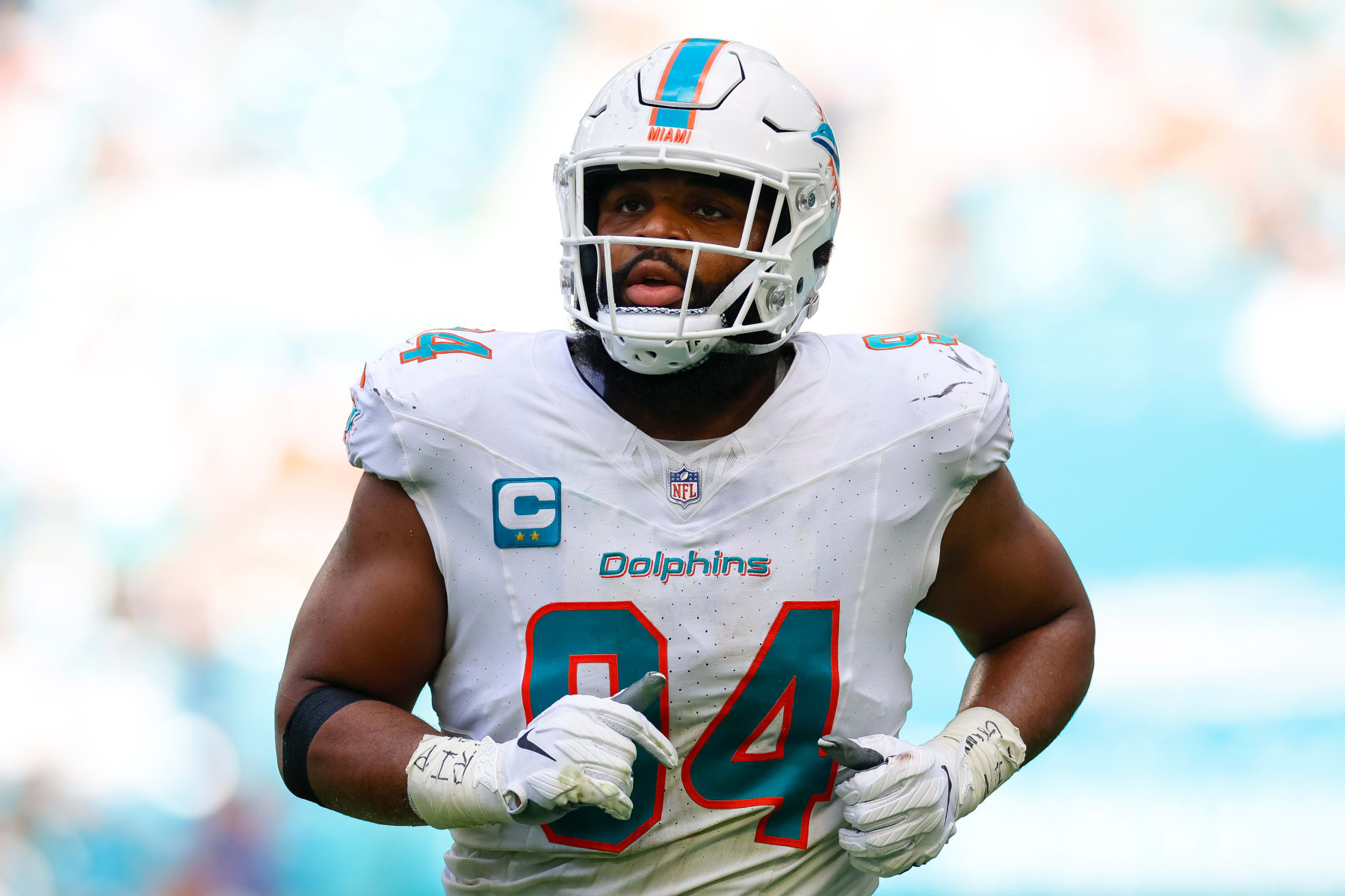 MIAMI GARDENS, FLORIDA - DECEMBER 17: Christian Wilkins #94 of the Miami Dolphins runs on the field during a game against the New York Jets at Hard Rock Stadium on December 17, 2023 in Miami Gardens, Florida. (Photo by Brandon Sloter/Image Of Sport/Getty Images)