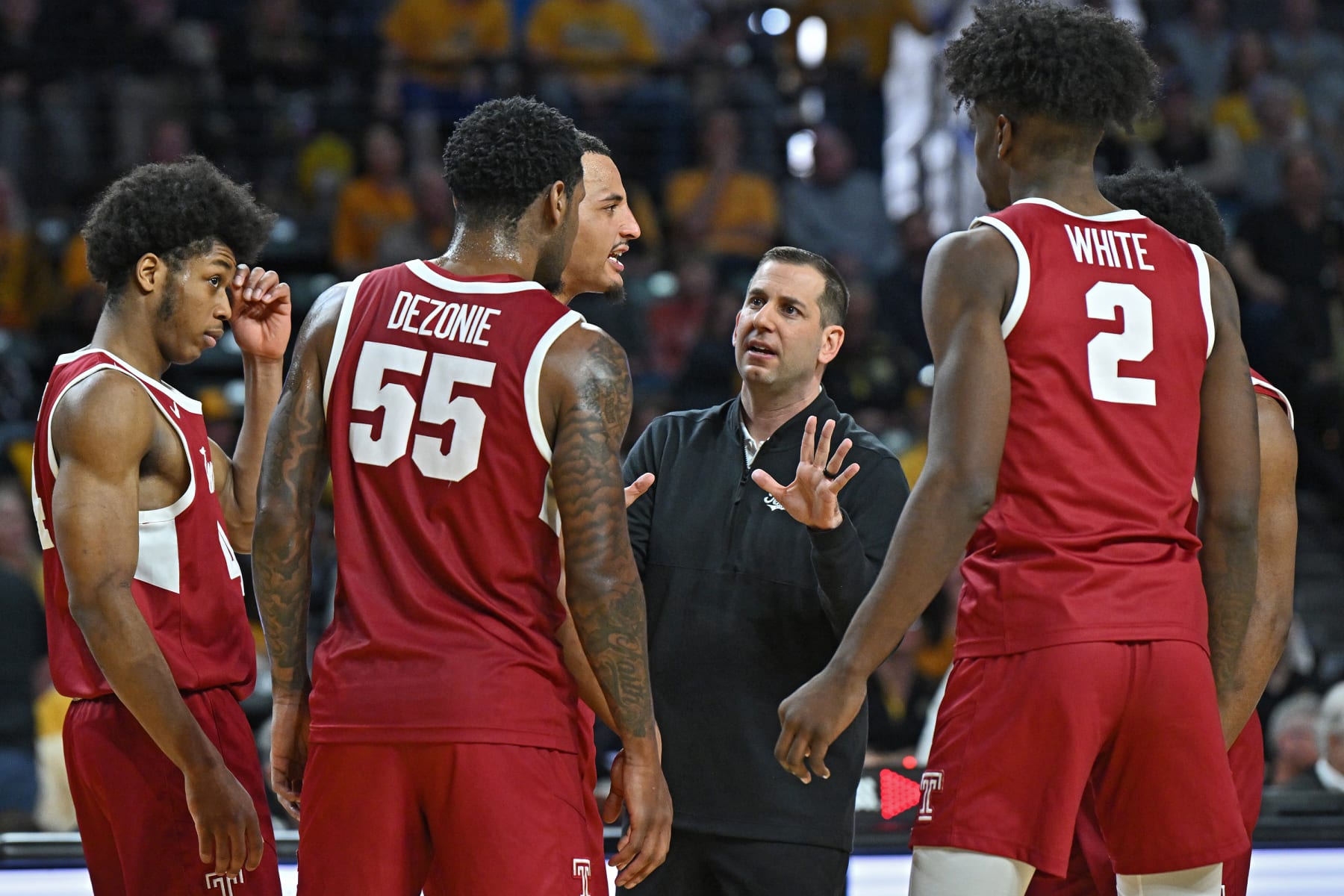WICHITA, KS - FEBRUARY 25: Head coach Adam Fisher of the Temple Owls talks with his players during a timeout in the second half against the Wichita State Shockers at Charles Koch Arena on February 25, 2024 in Wichita, Kansas. (Photo by Peter G. Aiken/Getty Images)