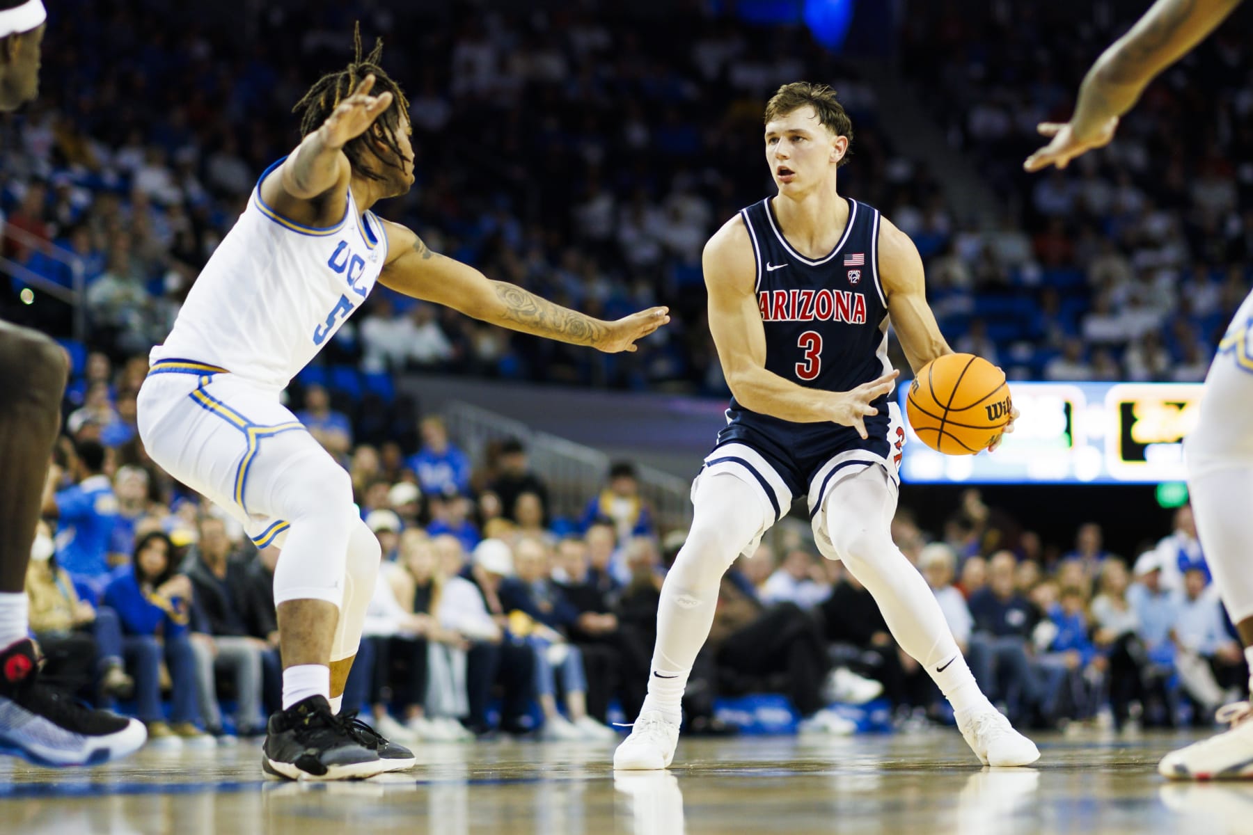 LOS ANGELES, CA - MARCH 07: Arizona Wildcats guard Pelle Larsson (3) dribbles during a college basketball game against the UCLA Bruins on March 7, 2024 at Pauley Pavilion in Los Angeles, CA. (Photo by Ric Tapia/Icon Sportswire via Getty Images)