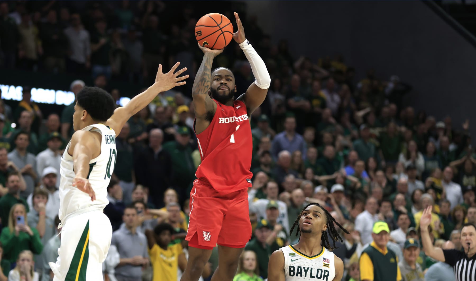 WACO, TX - FEBRUARY 24: Jamal Shead #1 of the Houston Cougars attempts a shot just after the buzzer in the second half against the Baylor Bears at Foster Pavilion on February 24, 2024 in Waco, Texas. (Photo by Ron Jenkins/Getty Images)