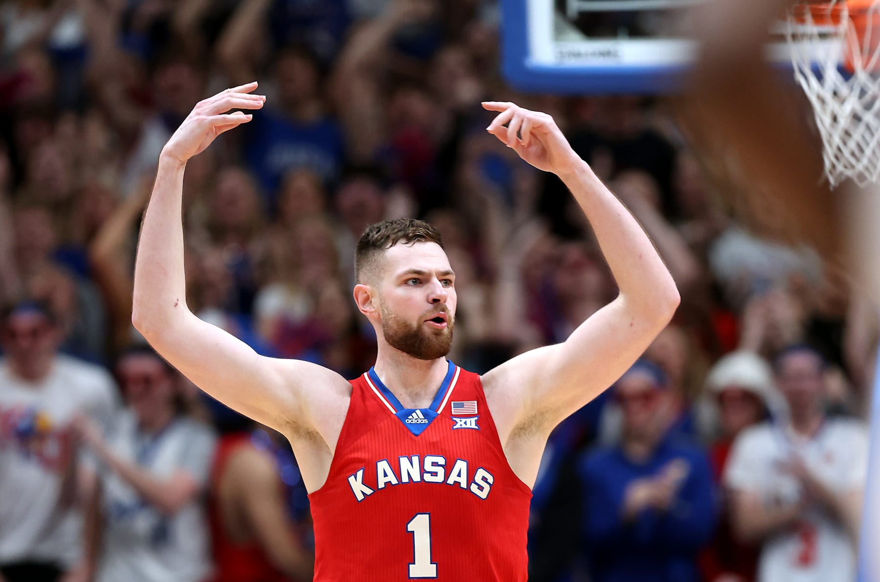 LAWRENCE, KANSAS - MARCH 05:  Hunter Dickinson #1 of the Kansas Jayhawks reacts after scoring during the 1st half of the game against the Kansas State Wildcats at Allen Fieldhouse on March 05, 2024 in Lawrence, Kansas. (Photo by Jamie Squire/Getty Images)
