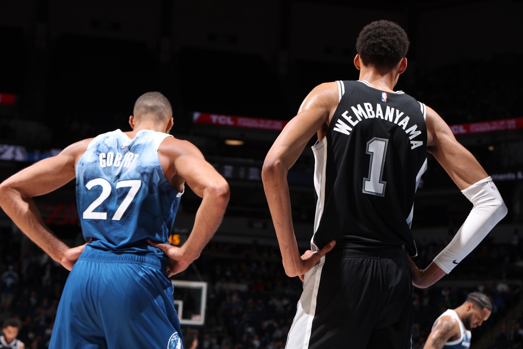 MINNEAPOLIS, MN -  FEBRUARY 27: Victor Wembanyama #1 of the San Antonio Spurs and Rudy Gobert #27 of the Minnesota Timberwolves look on during the game on February 27, 2024 at Target Center in Minneapolis, Minnesota. NOTE TO USER: User expressly acknowledges and agrees that, by downloading and or using this Photograph, user is consenting to the terms and conditions of the Getty Images License Agreement. Mandatory Copyright Notice: Copyright 2024 NBAE (Photo by David Sherman/NBAE via Getty Images)