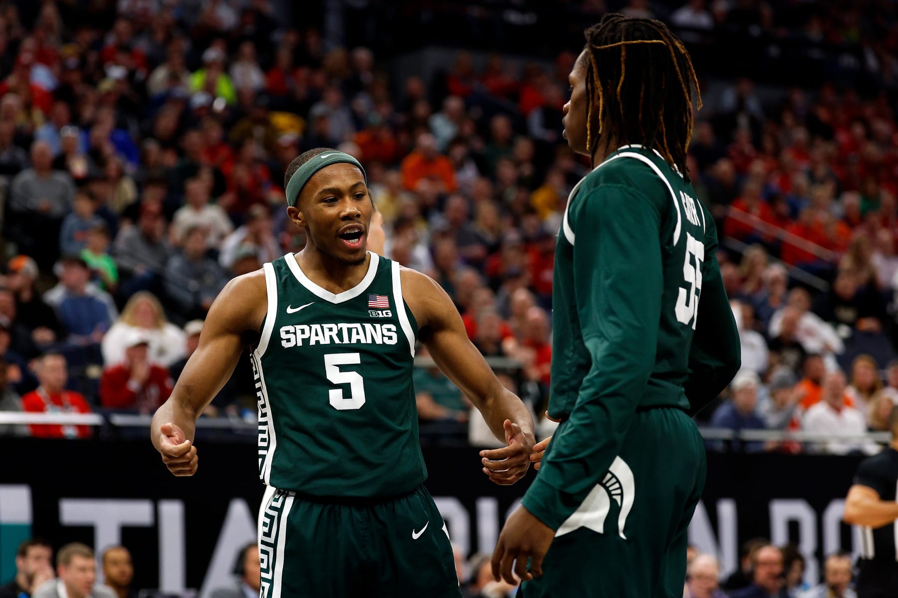 MINNEAPOLIS, MINNESOTA - MARCH 15: Tre Holloman #5 of the Michigan State Spartans celebrates against the Purdue Boilermakers in the second half at Target Center in the Quarterfinals of the Big Ten Tournament on March 15, 2024 in Minneapolis, Minnesota. The Boilermakers defeated the Spartans 67-62. (Photo by David Berding/Getty Images)