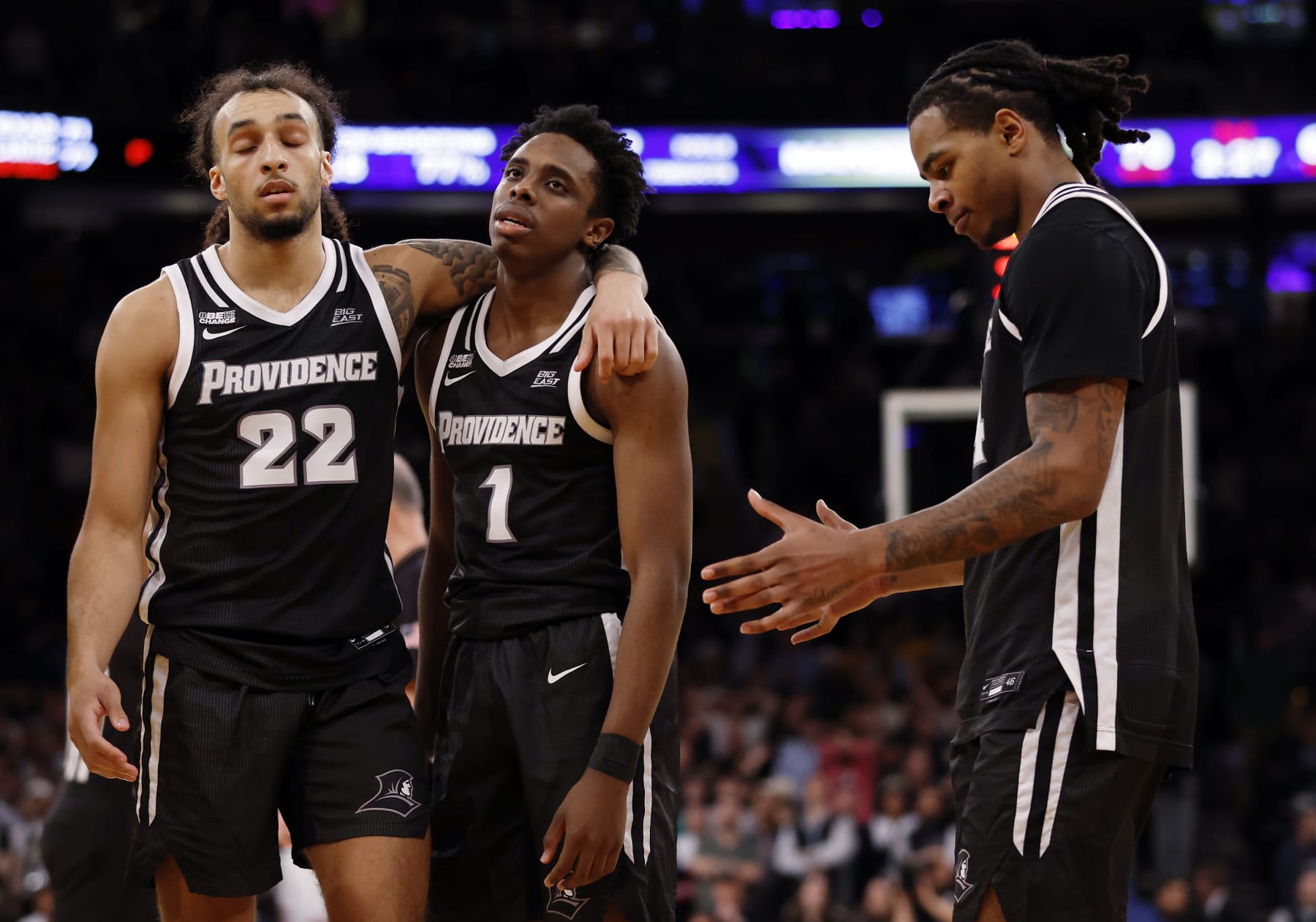 NEW YORK, NEW YORK - MARCH 15: Devin Carter #22, Jayden Pierre #1, and Corey Floyd Jr. #14 of the Providence Friars react in the second half against the Marquette Golden Eagles during the Semifinal round of the Big East Basketball Tournament at Madison Square Garden on March 15, 2024 in New York City. Marquette won 79-68. (Photo by Sarah Stier/Getty Images)