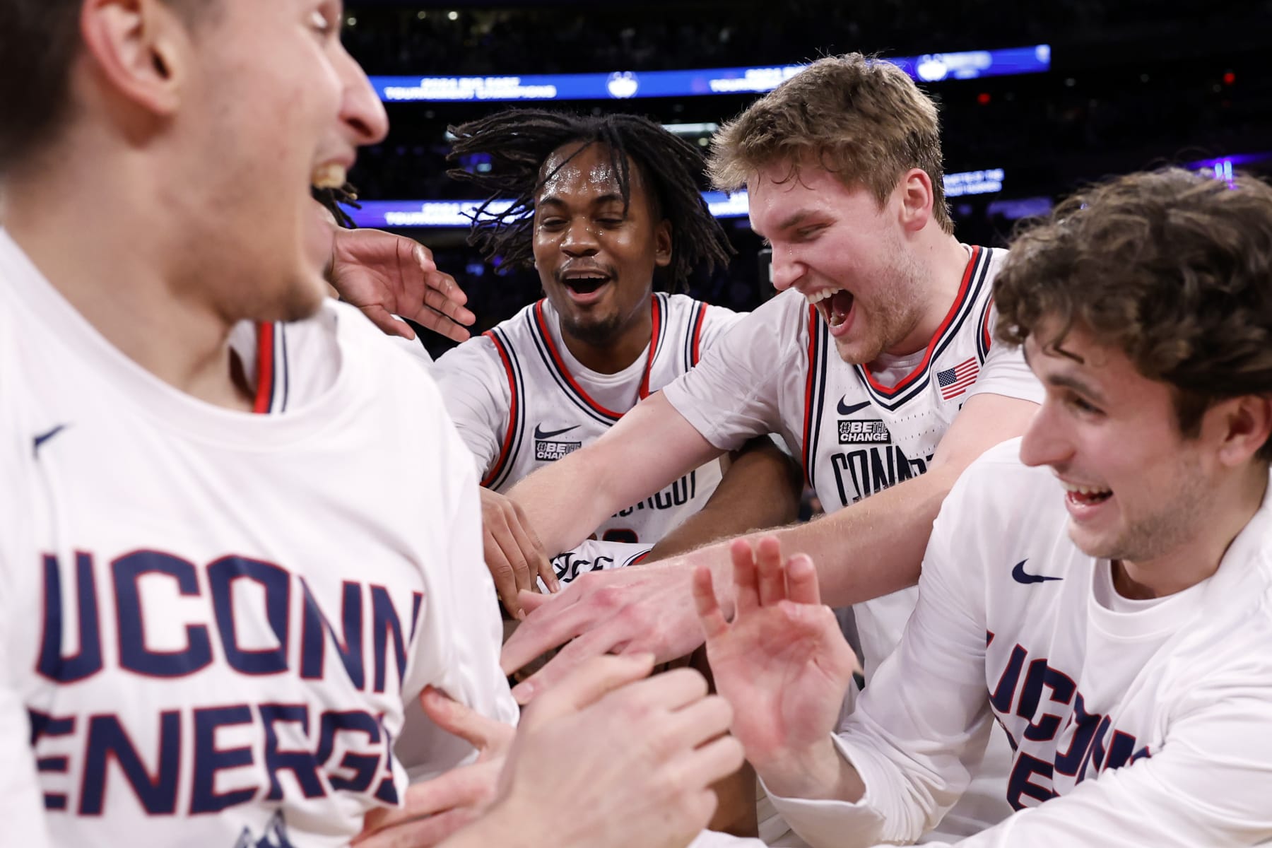 NEW YORK, NEW YORK - MARCH 16: The Connecticut Huskies celebrate after the second half against the Marquette Golden Eagles during the Big East Basketball Tournament Final at Madison Square Garden on March 16, 2024 in New York City. The Huskies won 73-57. (Photo by Sarah Stier/Getty Images)