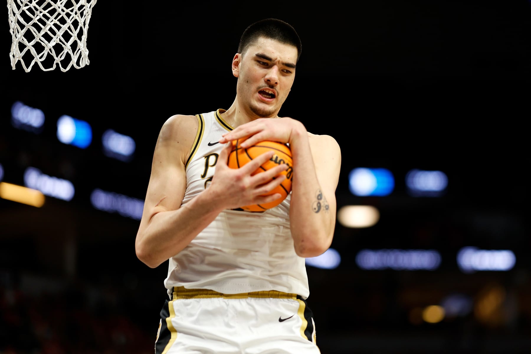 MINNEAPOLIS, MINNESOTA - MARCH 16: Zach Edey #15 of the Purdue Boilermakers rebounds the ball against the Wisconsin Badgers in the second half at Target Center in the Semifinals of the Big Ten Tournament on March 16, 2024 in Minneapolis, Minnesota. The Badgers defeated the Boilermakers 76-75 in overtime. (Photo by David Berding/Getty Images)