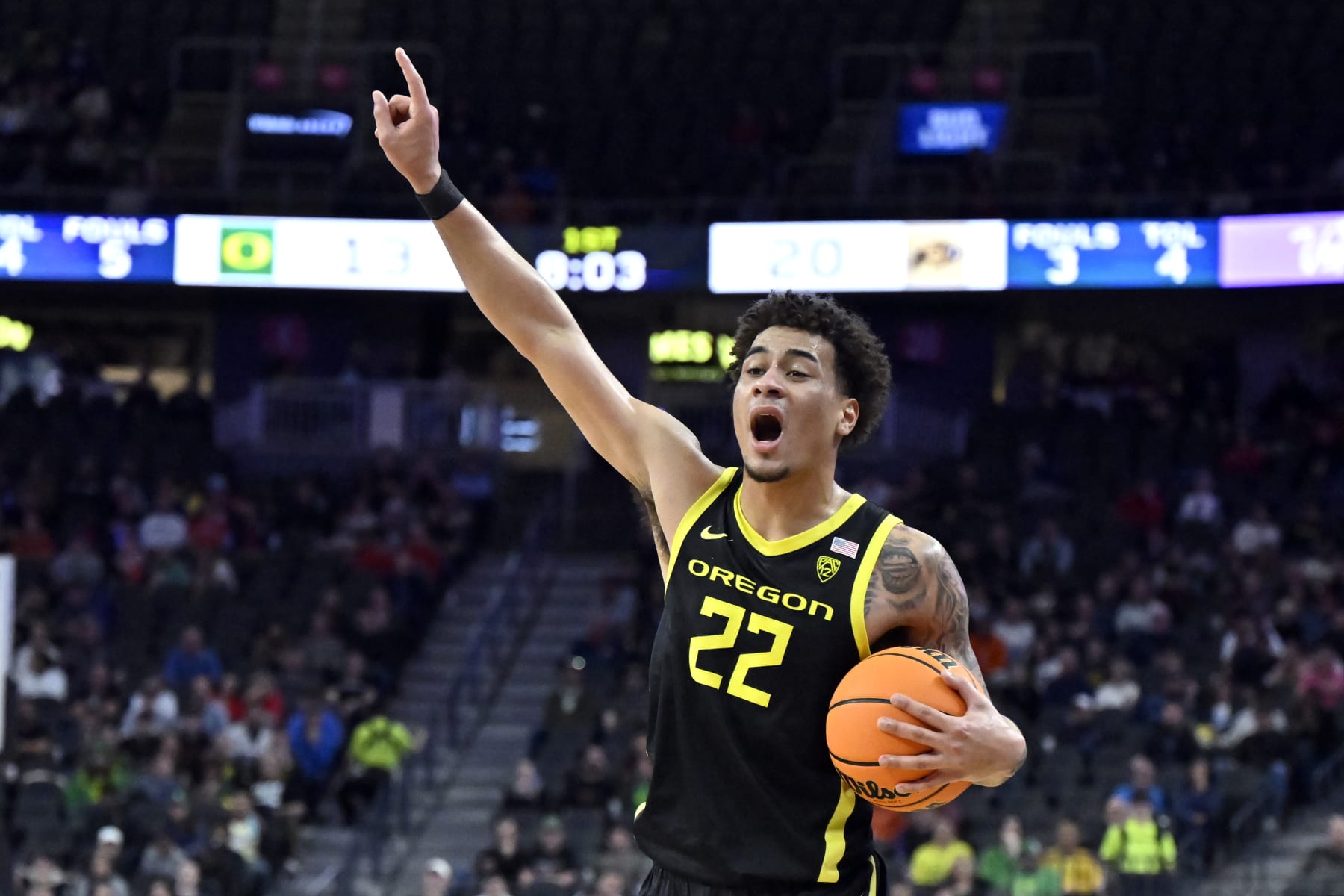 LAS VEGAS, NEVADA - MARCH 16: Jadrian Tracey #22 of the Oregon Ducks calls a play in the first half of the championship game against the Colorado Buffaloes in the Pac-12 basketball tournament at T-Mobile Arena on March 16, 2024 in Las Vegas, Nevada. (Photo by David Becker/Getty Images)