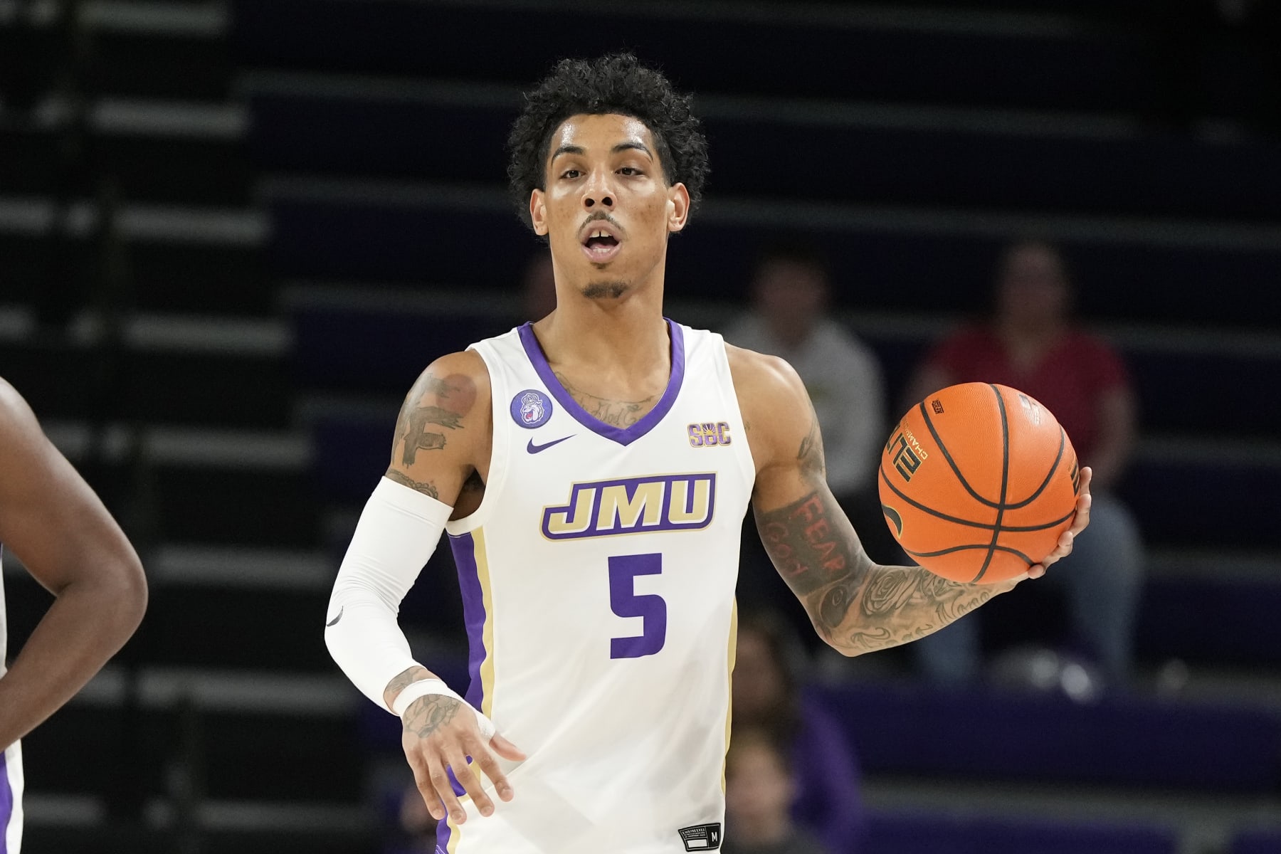 HARRISONBURG, VA - JANUARY 11: Terrence Edwards Jr. #5 of the James Madison Dukes dribbles the ball during a college basketball game against the South Alabama Jaguars at the Atlantic Union Bank Center on January 11, 2024 in Harrisonburg, Virginia. (Photo by Mitchell Layton/Getty Images)