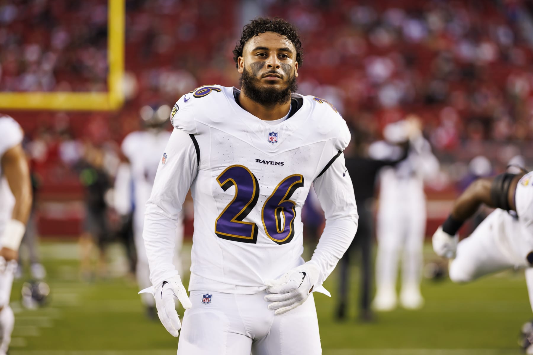 SANTA CLARA, CALIFORNIA - DECEMBER 25: Geno Stone #26 of the Baltimore Ravens looks on during pregame warmups before an NFL football game against the San Francisco 49ers at Levi's Stadium on December 25, 2023 in Santa Clara, California. (Photo by Ryan Kang/Getty Images)