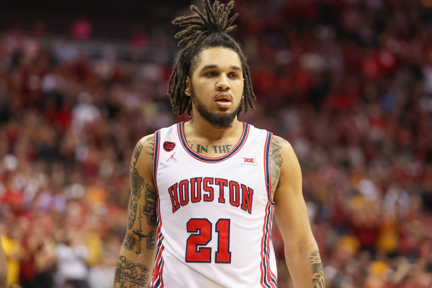 KANSAS CITY, MO - MARCH 16: Houston Cougars guard Emanuel Sharp (21) in the first half of the Big 12 tournament final between the Iowa State Cyclones and Houston Cougars on Mar 16, 2024 at T-Mobile Center in Kansas City, MO. (Photo by Scott Winters/Icon Sportswire via Getty Images)
