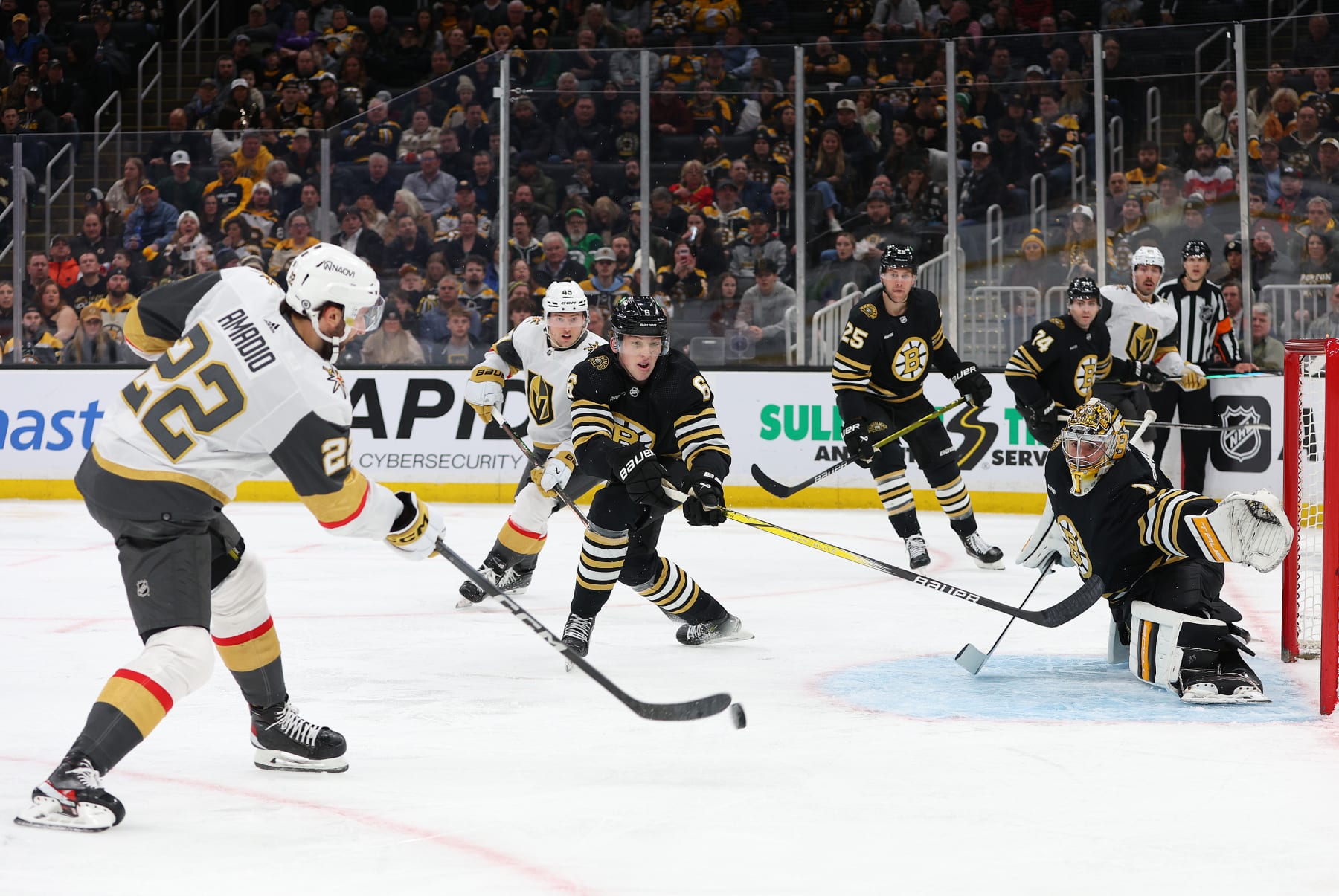 BOSTON, MA - FEBRUARY 29: Vegas Golden Knights right wing Michael Amadio (22) takes a shot against Boston Bruins goalie Jeremy Swayman (1) during a NHL game between Vegas Golden Knights and Boston Bruins on February 29, 2024, at TD Garden in Boston, MA. (Photo by M. Anthony Nesmith/Icon Sportswire via Getty Images)
