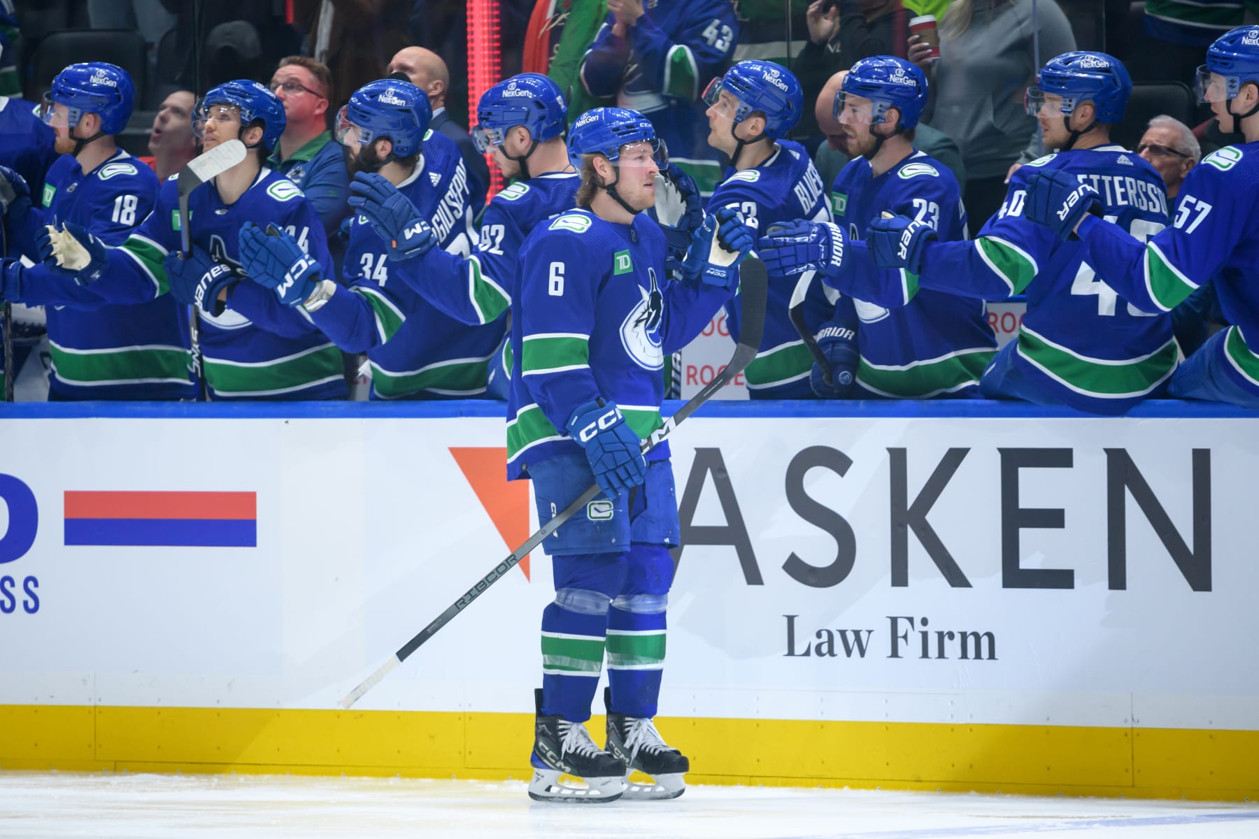 VANCOUVER, CANADA - MARCH 16: Brock Boeser #6 of the Vancouver Canucks is congratulated at the players bench after scoring a goal against the Washington Capitals during the first period of their NHL game at Rogers Arena on March 16, 2024 in Vancouver, British Columbia, Canada. (Photo by Derek Cain/Getty Images)