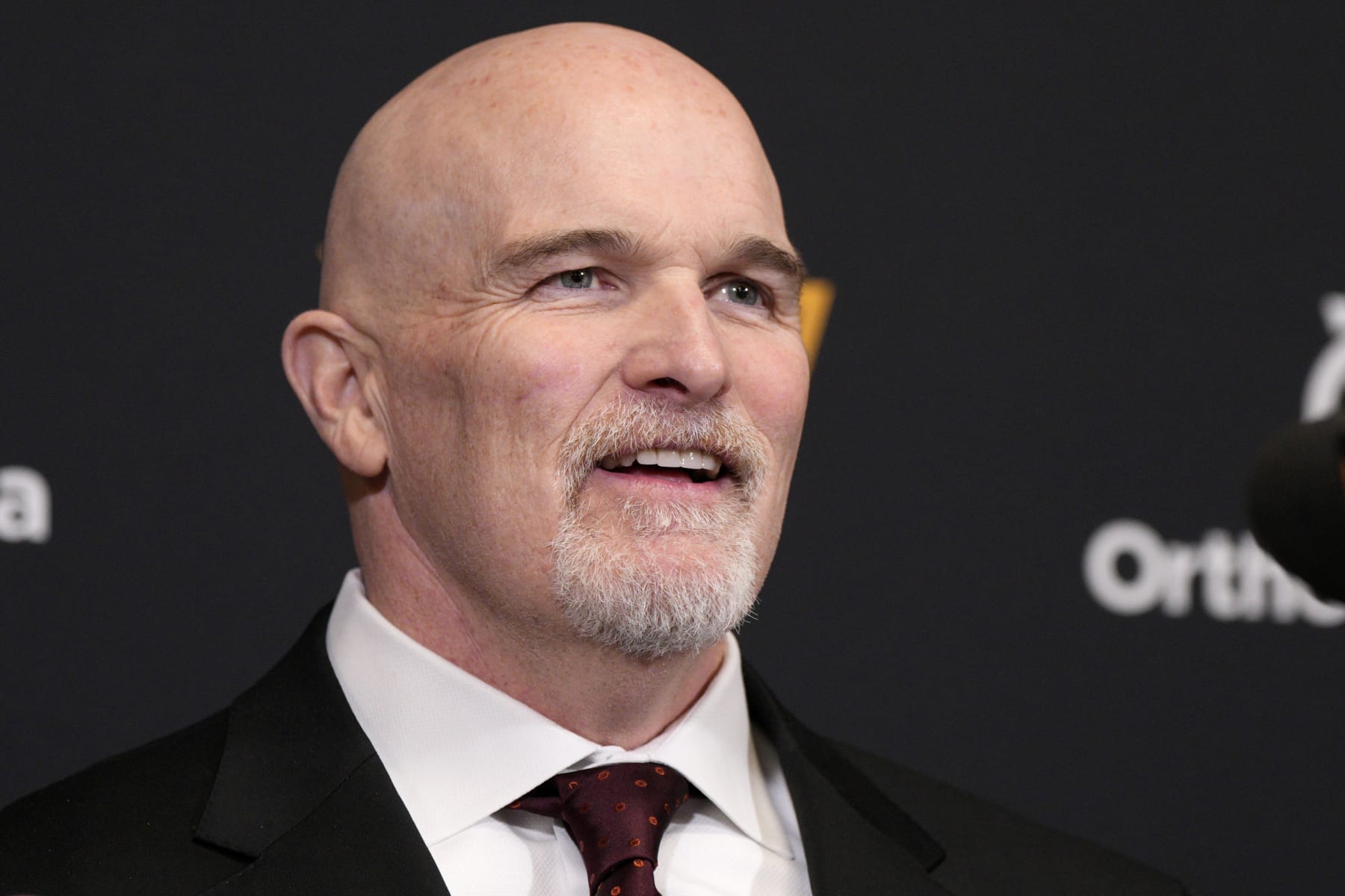 ASHBURN, VIRGINIA - FEBRUARY 05: Head coach Dan Quinn of the Washington Commanders speaks during an introductory press conference at OrthoVirginia Training Center at Commanders Park on February 05, 2024 in Ashburn, Virginia. (Photo by Jess Rapfogel/Getty Images)